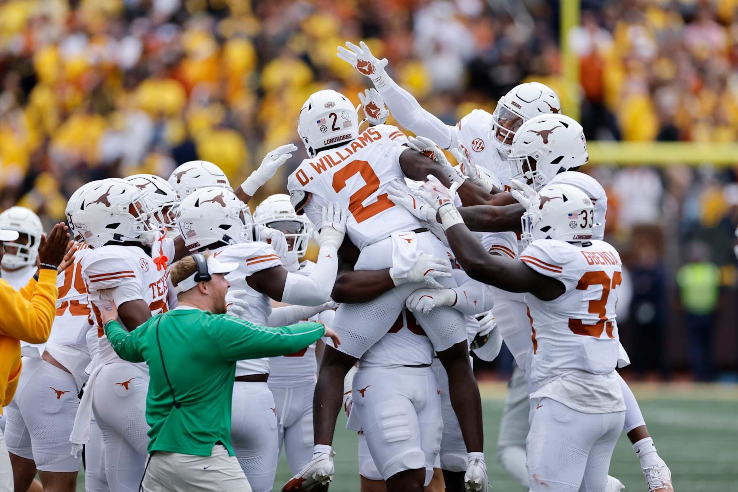 ANN ARBOR, MI - SEPTEMBER 07: Texas Longhorns defensive back Derek Williams Jr. (2) celebrates with teammates after an interception during a college football game against the Michigan Wolverines on September 07, 2024 at Michigan Stadium in Ann Arbor, Michigan. (Photo by Joe Robbins/Icon Sportswire via Getty Images)