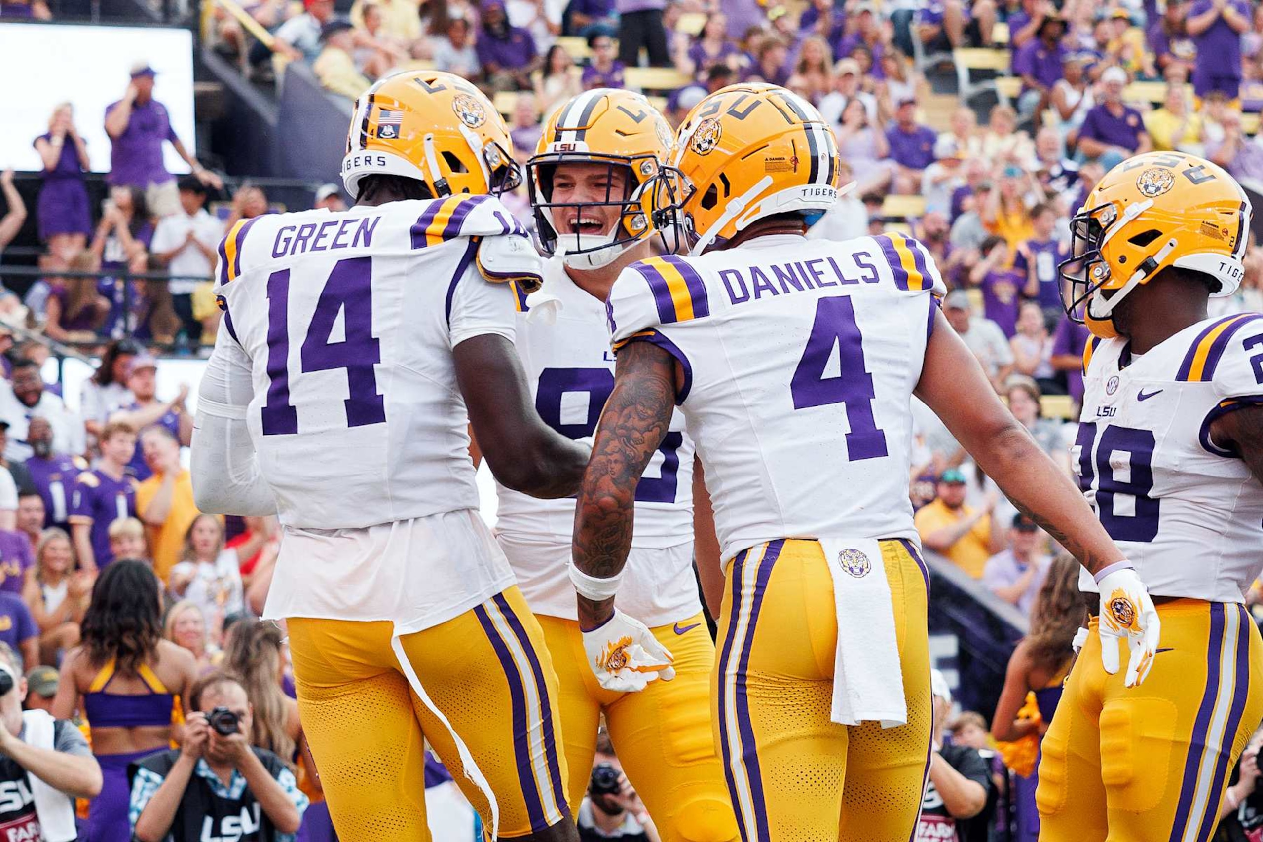 BATON ROUGE, LA - SEPTEMBER 07: LSU Tigers tight end Trey'Dez Green (14) celebrate after a touchdown during a game between the LSU Tigers and the Nicholls Colonels on September 07, 2024, at Tiger Stadium in Baton Rouge, Louisiana. (Photo by John Korduner/Icon Sportswire via Getty Images)