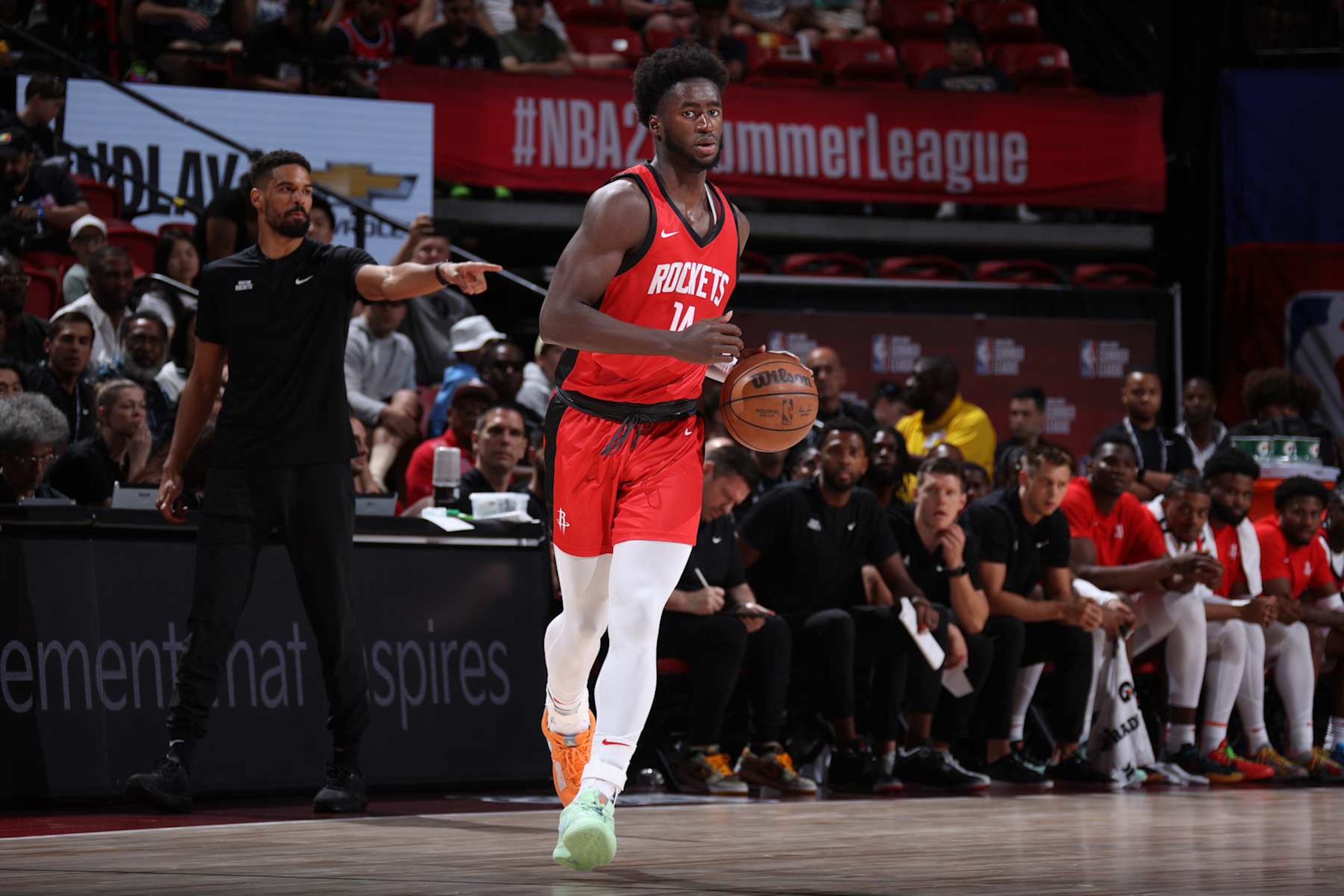 LAS VEGAS, NV - JULY 14: AJ Griffin #14 of the Houston Rockets dribbles the ball during the game against the Washington Wizards on July 14, 2024 at the Thomas & Mack Center in Las Vegas, Nevada. NOTE TO USER: User expressly acknowledges and agrees that, by downloading and or using this photograph, User is consenting to the terms and conditions of the Getty Images License Agreement. Mandatory Copyright Notice: Copyright 2024 NBAE (Photo by Stephen Gosling/NBAE via Getty Images)