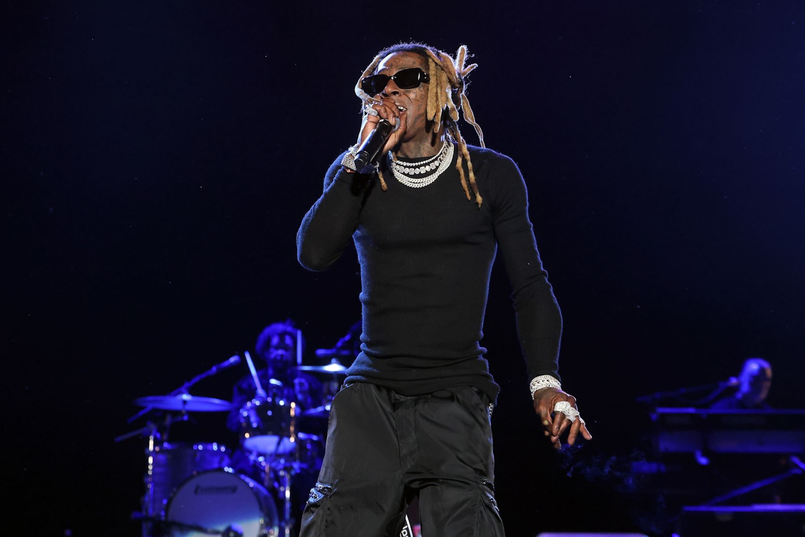 PHILADELPHIA, PENNSYLVANIA - JUNE 02: Lil Wayne performs with The Roots during the 2024 Roots Picnic at The Mann on June 02, 2024 in Philadelphia, Pennsylvania. (Photo by Taylor Hill/Getty Images for Live Nation Urban) PHILADELPHIA, PENNSYLVANIA - JUNE 02: Lil Wayne performs with The Roots during the 2024 Roots Picnic at The Mann on June 02, 2024 in Philadelphia, Pennsylvania. (Photo by Taylor Hill/Getty Images for Live Nation Urban)