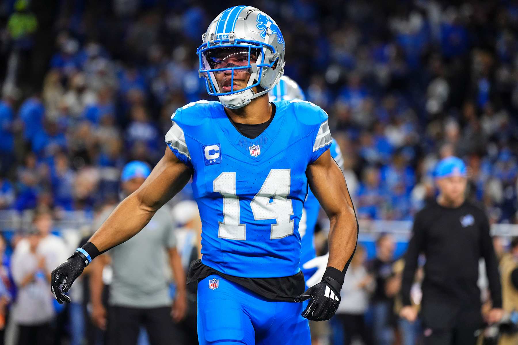 DETROIT, MI - SEPTEMBER 08: Amon-Ra St. Brown #14 of the Detroit Lions warms up prior to an NFL football game against the Los Angeles Rams at Ford Field on September 8, 2024 in Detroit, Michigan. (Photo by Cooper Neill/Getty Images)