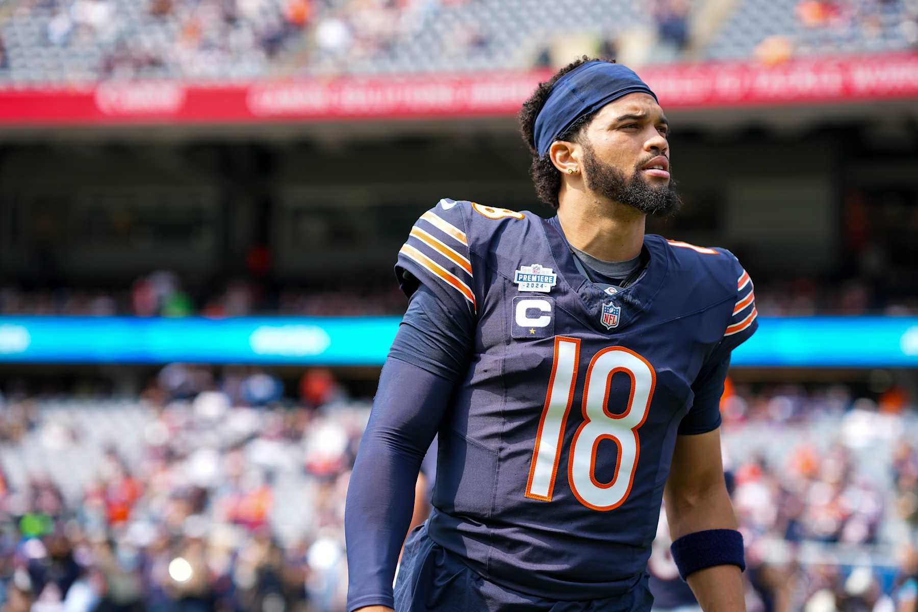 CHICAGO, IL - SEPTEMBER 8: Quarterback Caleb Williams #18 of the Chicago Bears stretches prior to an NFL football game against the Tennessee Titans, at Soldier Field on September 8, 2024 in Chicago, Illinois. (Photo by Todd Rosenberg/Getty Images)
