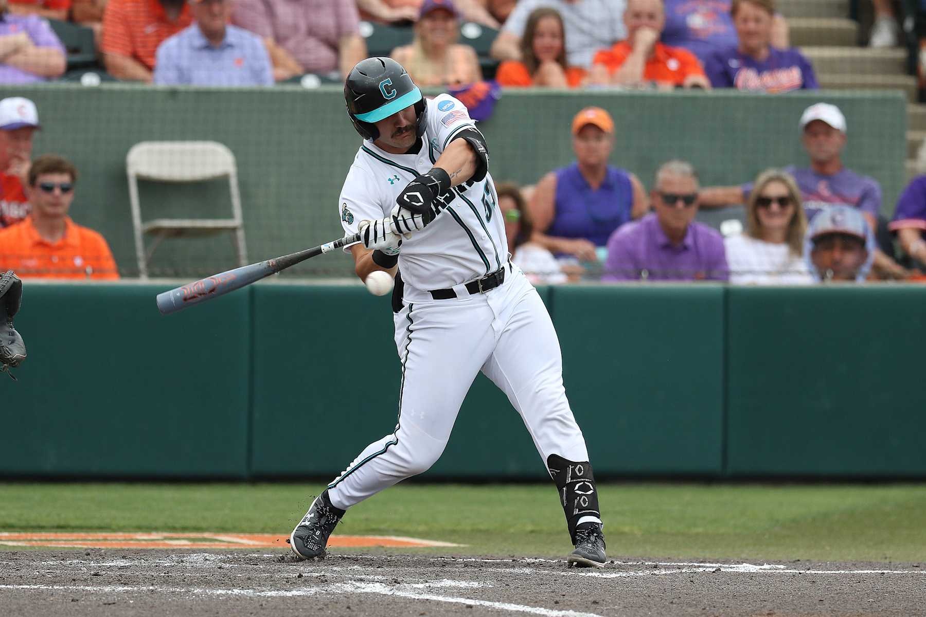 CLEMSON, SC - JUNE 01: Coastal Carolina Chanticleer catcher Derek Bender (53) looks to make contach with the ball during the NCAA Division 1 Regional College Baseball game between the High Point Panthers and the Vanderbilt Commodores on June 1, 2024, at Doug Kingsmore Stadium in Clemson, S.C. (Photo by John Byrum/Icon Sportswire via Getty Images) CLEMSON, SC - JUNE 01: Coastal Carolina Chanticleer catcher Derek Bender (53) looks to make contach with the ball during the NCAA Division 1 Regional College Baseball game between the High Point Panthers and the Vanderbilt Commodores on June 1, 2024, at Doug Kingsmore Stadium in Clemson, S.C. (Photo by John Byrum/Icon Sportswire via Getty Images)