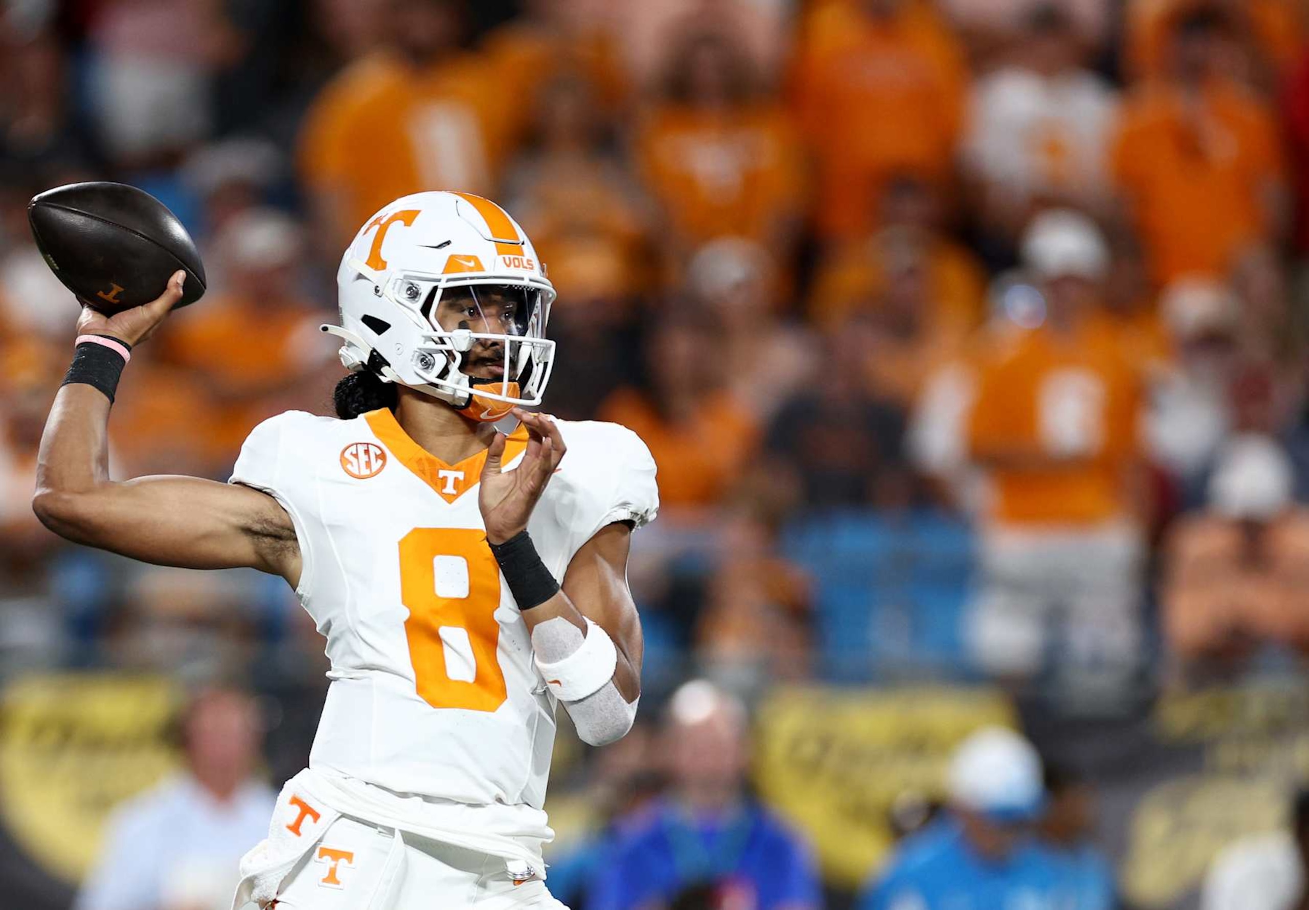 CHARLOTTE, NORTH CAROLINA - SEPTEMBER 07: Nico Iamaleava #8 of the Tennessee Volunteers attempts a pass during the first half of the Duke's Mayo Classic against the NC State Wolfpack at Bank of America Stadium on September 07, 2024 in Charlotte, North Carolina. (Photo by Jared C. Tilton/Getty Images) CHARLOTTE, NORTH CAROLINA - SEPTEMBER 07: Nico Iamaleava #8 of the Tennessee Volunteers attempts a pass during the first half of the Duke's Mayo Classic against the NC State Wolfpack at Bank of America Stadium on September 07, 2024 in Charlotte, North Carolina. (Photo by Jared C. Tilton/Getty Images)