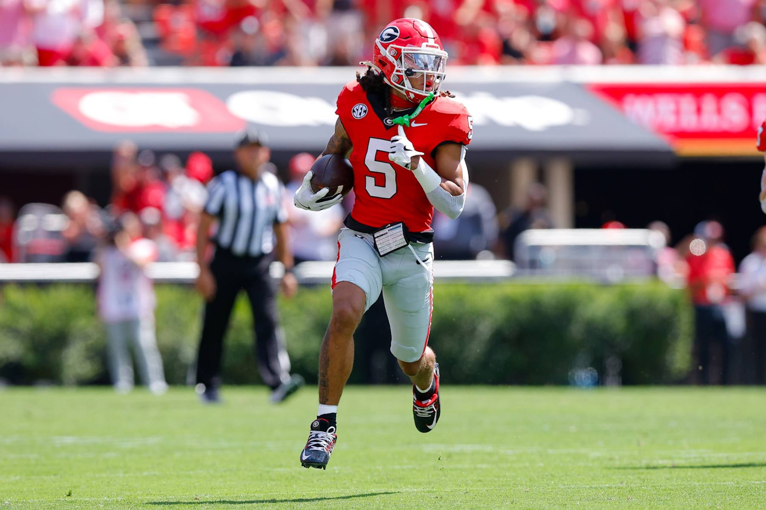 ATHENS, GEORGIA - SEPTEMBER 7: Anthony Evans III #5 of the Georgia Bulldogs returns a punt during the first quarter against the Tennessee Tech Golden Eagles at Sanford Stadium on September 7, 2024 in Athens, Georgia. (Photo by Todd Kirkland/Getty Images) ATHENS, GEORGIA - SEPTEMBER 7: Anthony Evans III #5 of the Georgia Bulldogs returns a punt during the first quarter against the Tennessee Tech Golden Eagles at Sanford Stadium on September 7, 2024 in Athens, Georgia. (Photo by Todd Kirkland/Getty Images)