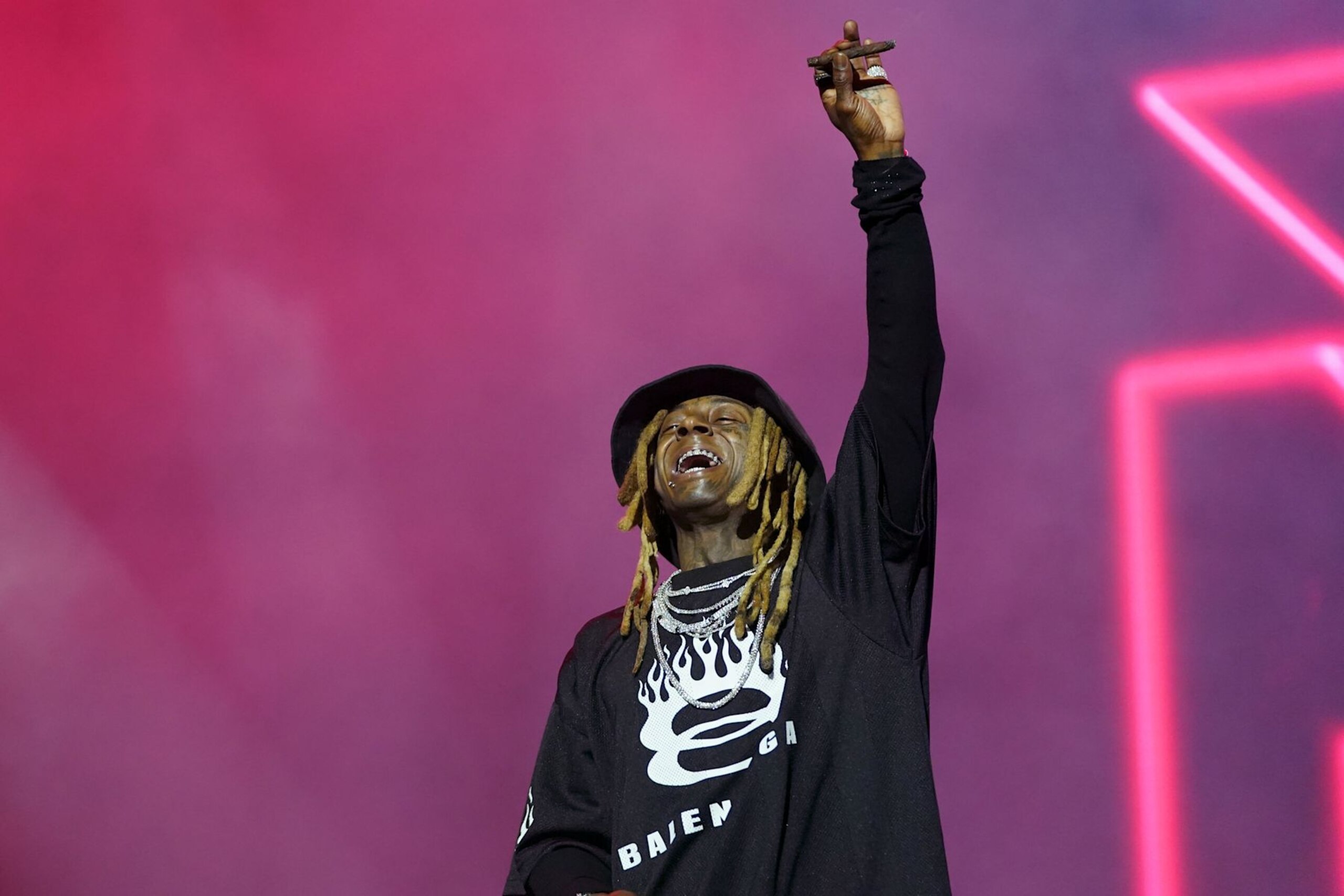 NEW ORLEANS, LOUISIANA - JULY 05: Lil Wayne performs onstage during Day 1 of the 2024 ESSENCE Festival of Culture presented by Coca-Cola at Caesars Superdome on July 05, 2024 in New Orleans, Louisiana. (Photo by Bennett Raglin/Getty Images for ESSENCE)