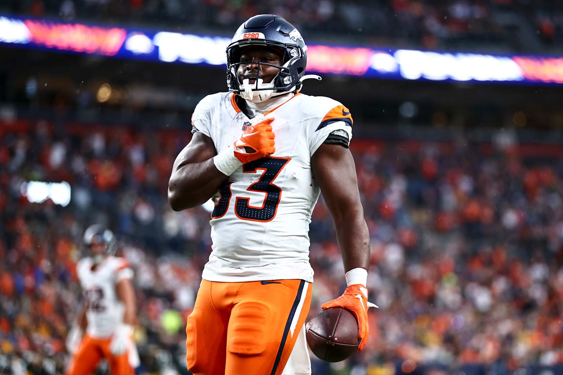 DENVER, COLORADO - AUGUST 18: Javonte Williams #33 of the Denver Broncos celebrates a touchdown, which was later called off by officials, in the first half of the preseason game against the Green Bay Packers at Empower Field At Mile High on August 18, 2024 in Denver, Colorado. (Photo by Tyler Schank/Getty Images)