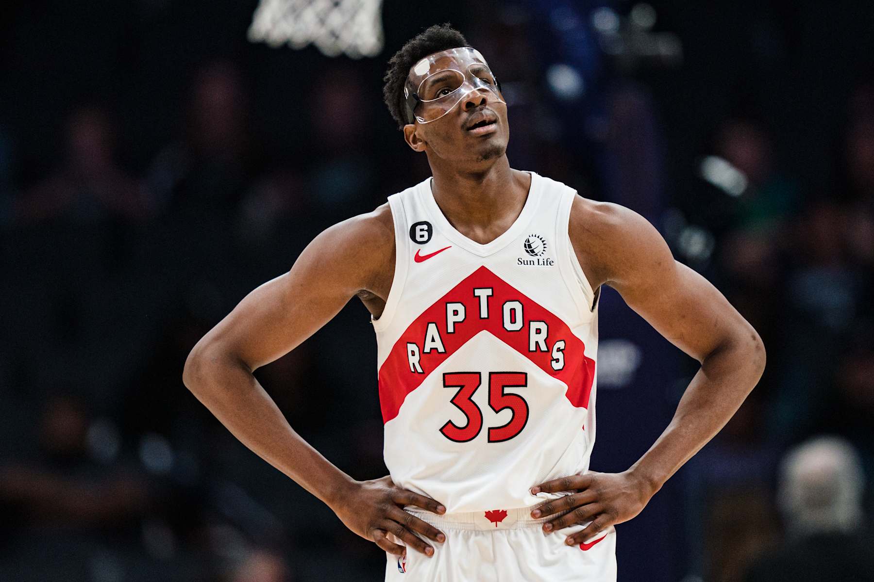 CHARLOTTE, NORTH CAROLINA - APRIL 02: Christian Koloko #35 of the Toronto Raptors looks on against the Charlotte Hornets during their game at Spectrum Center on April 02, 2023 in Charlotte, North Carolina. NOTE TO USER: User expressly acknowledges and agrees that, by downloading and or using this photograph, User is consenting to the terms and conditions of the Getty Images License Agreement. (Photo by Jacob Kupferman/Getty Images)