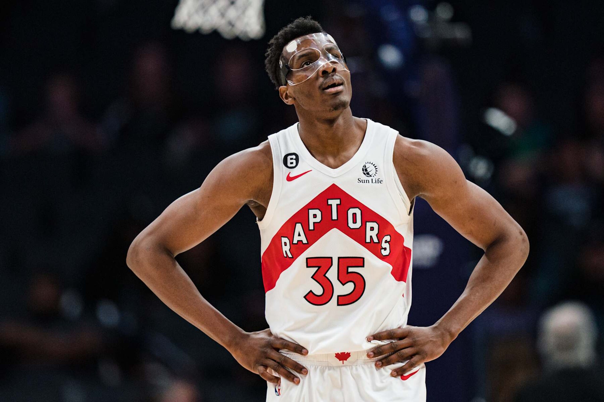 CHARLOTTE, NORTH CAROLINA - APRIL 02: Christian Koloko #35 of the Toronto Raptors looks on against the Charlotte Hornets during their game at Spectrum Center on April 02, 2023 in Charlotte, North Carolina. NOTE TO USER: User expressly acknowledges and agrees that, by downloading and or using this photograph, User is consenting to the terms and conditions of the Getty Images License Agreement. (Photo by Jacob Kupferman/Getty Images) CHARLOTTE, NORTH CAROLINA - APRIL 02: Christian Koloko #35 of the Toronto Raptors looks on against the Charlotte Hornets during their game at Spectrum Center on April 02, 2023 in Charlotte, North Carolina. NOTE TO USER: User expressly acknowledges and agrees that, by downloading and or using this photograph, User is consenting to the terms and conditions of the Getty Images License Agreement. (Photo by Jacob Kupferman/Getty Images)