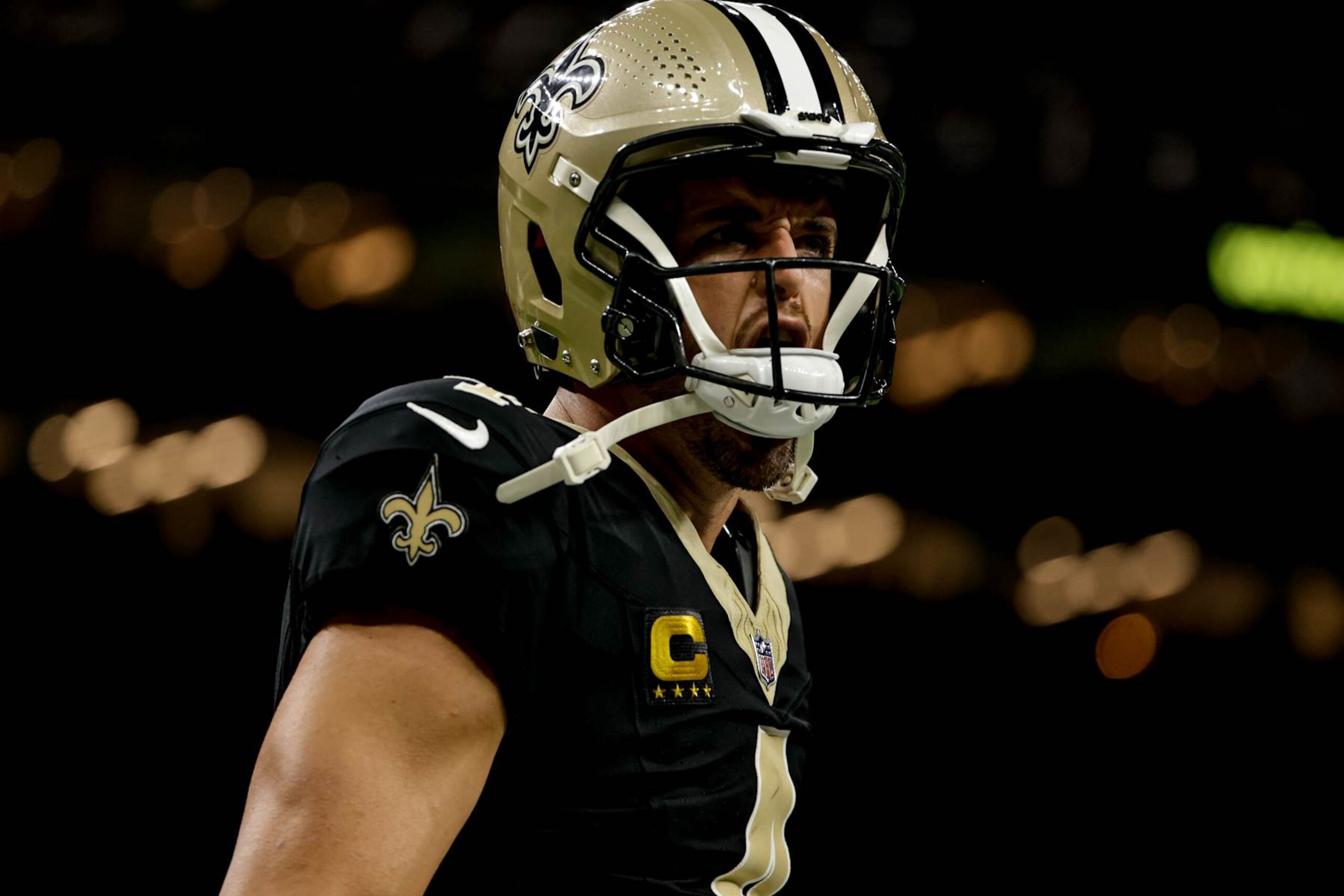 NEW  ORLEANS, LOUISIANA - SEPTEMBER 8: Derek Carr #4 of the New Orleans Saints celebrates after a touchdown against the Carolina Panthers during the first half at the Caesars Superdome on September 8, 2024 in New Orleans, Louisiana. (Photo by Derick E. Hingle/Getty Images)