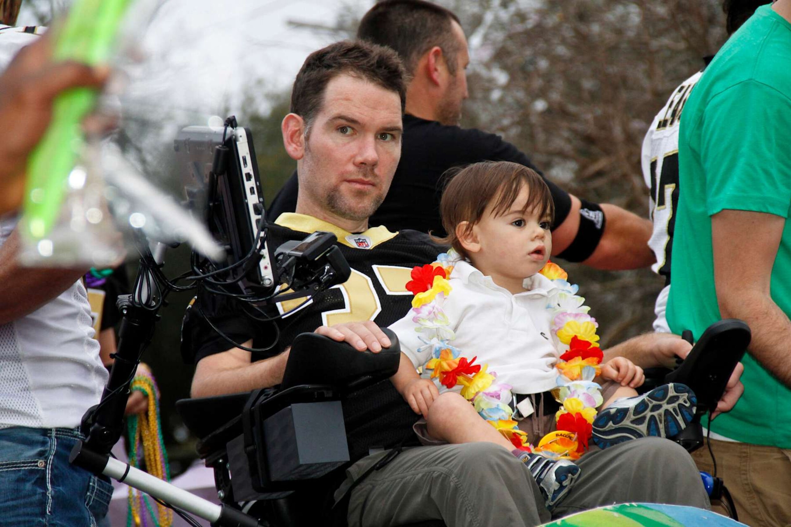 NEW ORLEANS, LA - FEBRUARY 10: Former NFL New Orleans Saints Safety, Steve Gleason with friends that started Team Gleason to generate public awareness and raise funds for Amyotrophic Lateral Sclerosis rides in the 2013 Krewe of Bacchus Mardi Gras Parade on February 10, 2013 in New Orleans, Louisiana. (Photo by Skip Bolen/Getty Images)