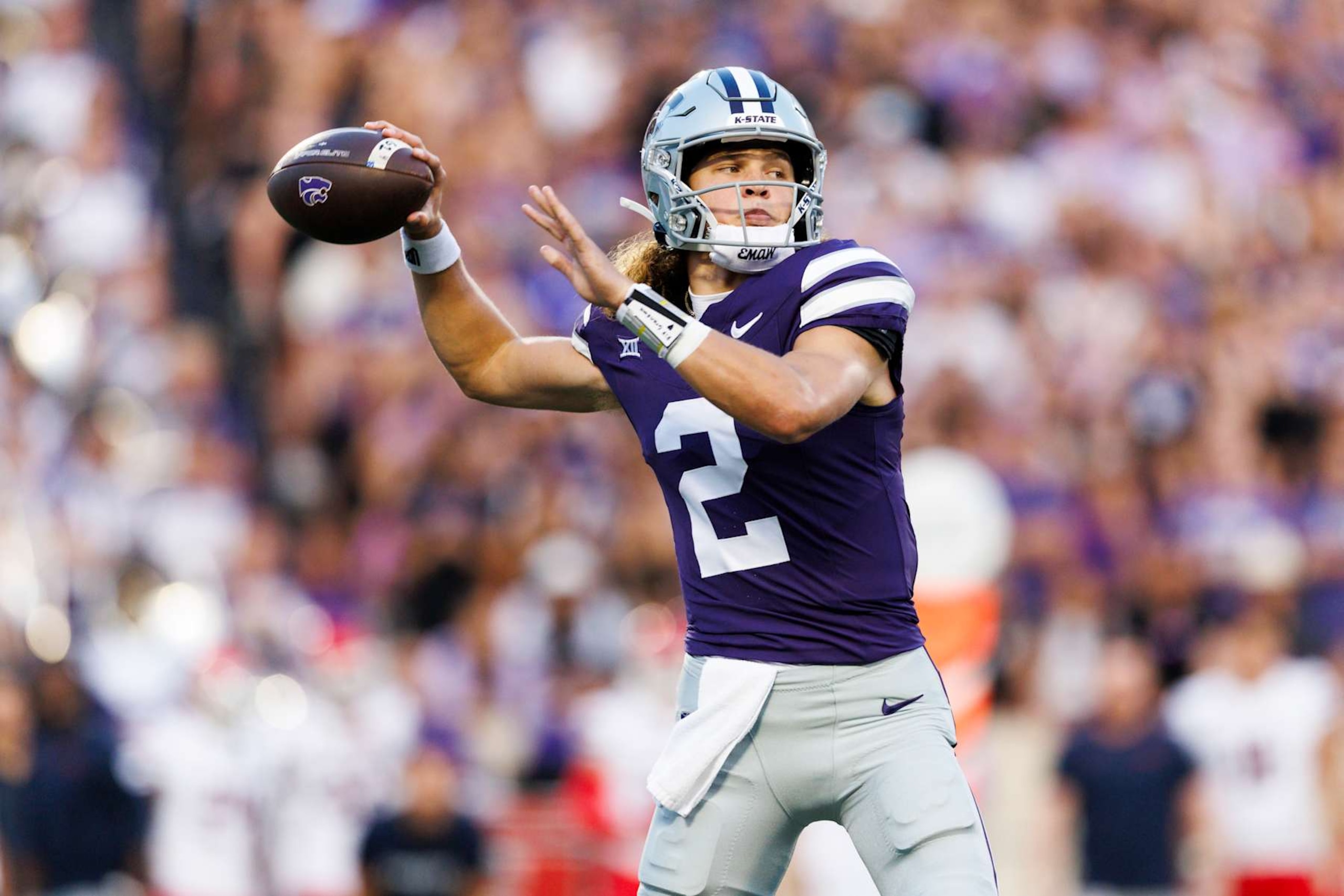 MANHATTAN, KANSAS - SEPTEMBER 13: Avery Johnson #2 of the Kansas State Wildcats throws during a game against Arizona Wildcats at Bill Snyder Family Football Stadium on September 13, 2024 in Manhattan, Kansas. (Photo by Ric Tapia/Getty Images)