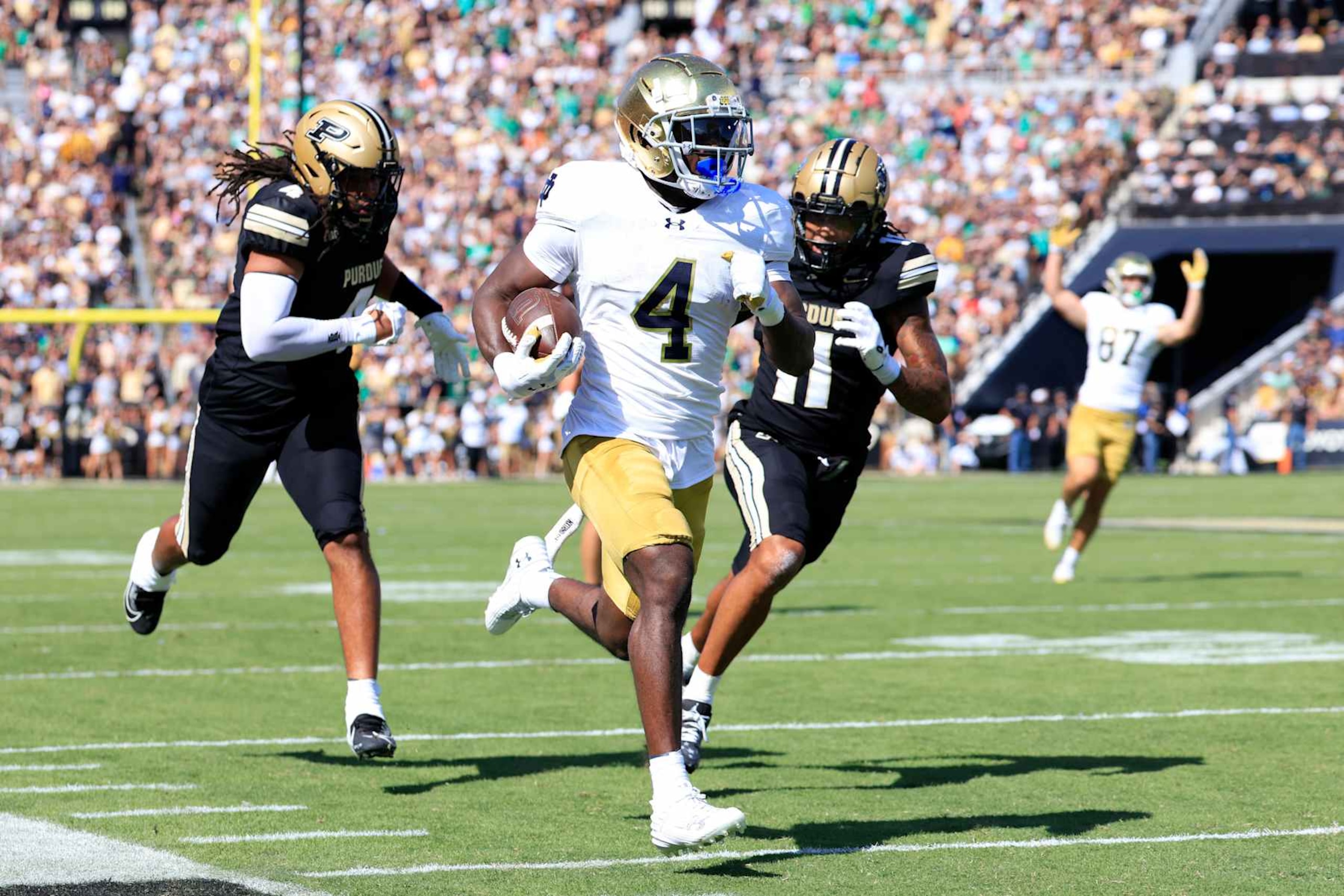 WEST LAFAYETTE, INDIANA - SEPTEMBER 14: Jeremiyah Love #4 of the Notre Dame Fighting Irish runs the ball for a touchdown during the first half against the Purdue Boilermakers at Ross-Ade Stadium on September 14, 2024 in West Lafayette, Indiana. (Photo by Justin Casterline/Getty Images)