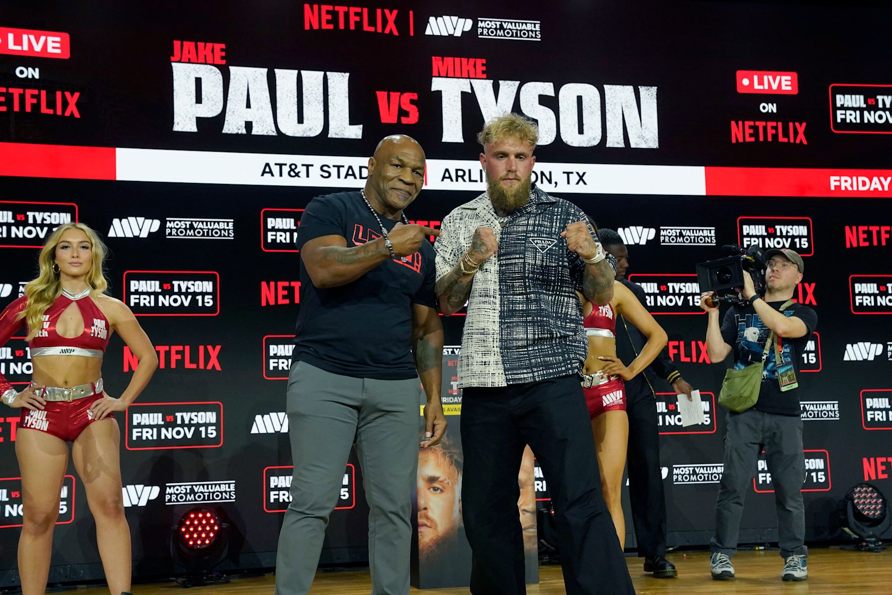 (L-R) Former US heavyweight boxing champion Mike Tyson and US YouTuber and boxer Jake Paul face off during a press conference at Fanatics Fest NYC on August 18, 2024, in New York City. The heavyweight match has been rescheduled for November 15, 2024, and will take place in Arlington, Texas. (Photo by TIMOTHY A. CLARY / AFP) (Photo by TIMOTHY A. CLARY/AFP via Getty Images)