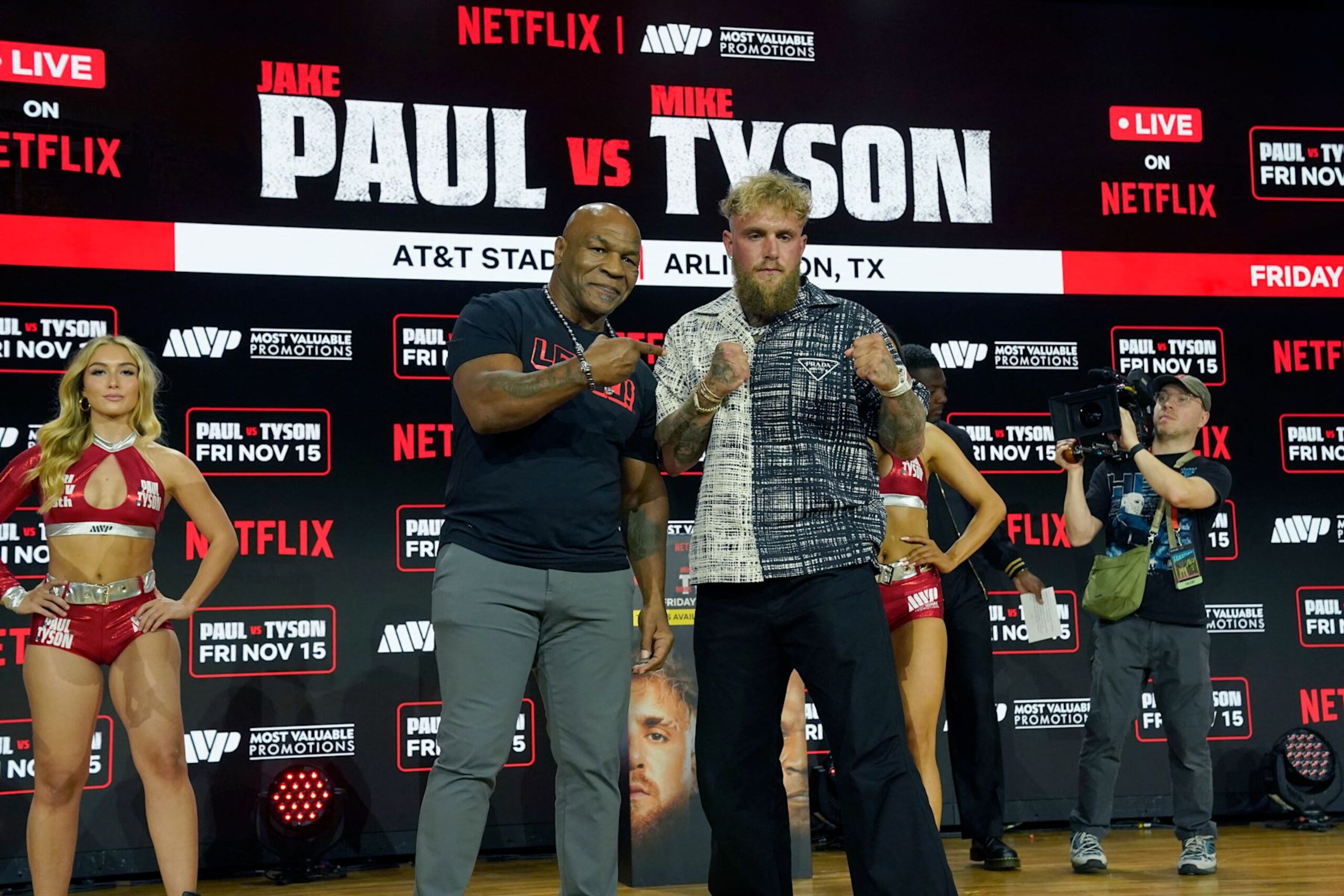 (L-R) Former US heavyweight boxing champion Mike Tyson and US YouTuber and boxer Jake Paul face off during a press conference at Fanatics Fest NYC on August 18, 2024, in New York City. The heavyweight match has been rescheduled for November 15, 2024, and will take place in Arlington, Texas. (Photo by TIMOTHY A. CLARY / AFP) (Photo by TIMOTHY A. CLARY/AFP via Getty Images) (L-R) Former US heavyweight boxing champion Mike Tyson and US YouTuber and boxer Jake Paul face off during a press conference at Fanatics Fest NYC on August 18, 2024, in New York City. The heavyweight match has been rescheduled for November 15, 2024, and will take place in Arlington, Texas. (Photo by TIMOTHY A. CLARY / AFP) (Photo by TIMOTHY A. CLARY/AFP via Getty Images)