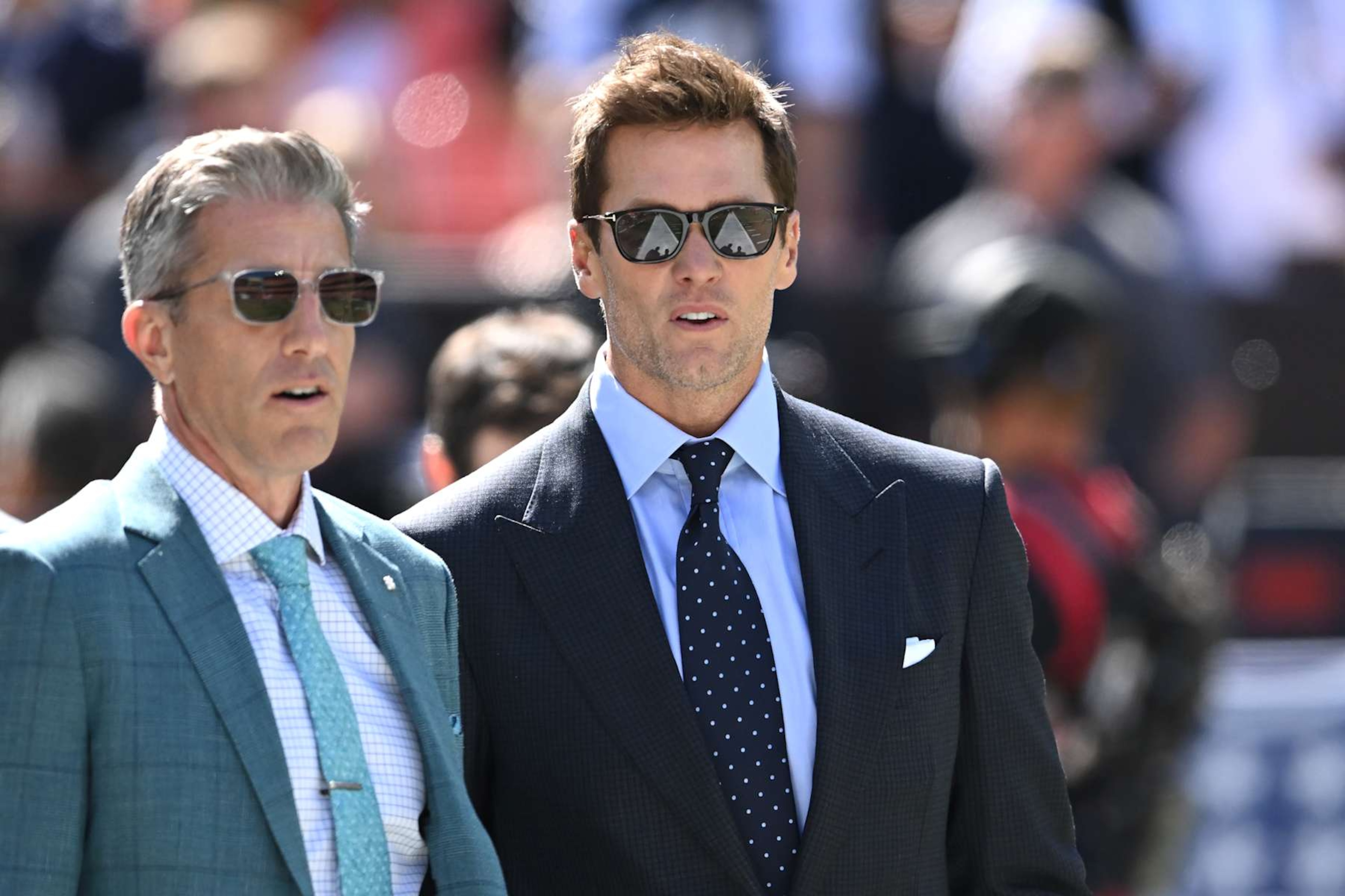 CLEVELAND, OHIO - SEPTEMBER 08: Broadcasters Kevin Burkhardt (L) and Tom Brady (R) walk along the field before the game between the Dallas Cowboys and Cleveland Browns at Cleveland Browns Stadium on September 08, 2024 in Cleveland, Ohio. (Photo by Nick Cammett/Getty Images) CLEVELAND, OHIO - SEPTEMBER 08: Broadcasters Kevin Burkhardt (L) and Tom Brady (R) walk along the field before the game between the Dallas Cowboys and Cleveland Browns at Cleveland Browns Stadium on September 08, 2024 in Cleveland, Ohio. (Photo by Nick Cammett/Getty Images)
