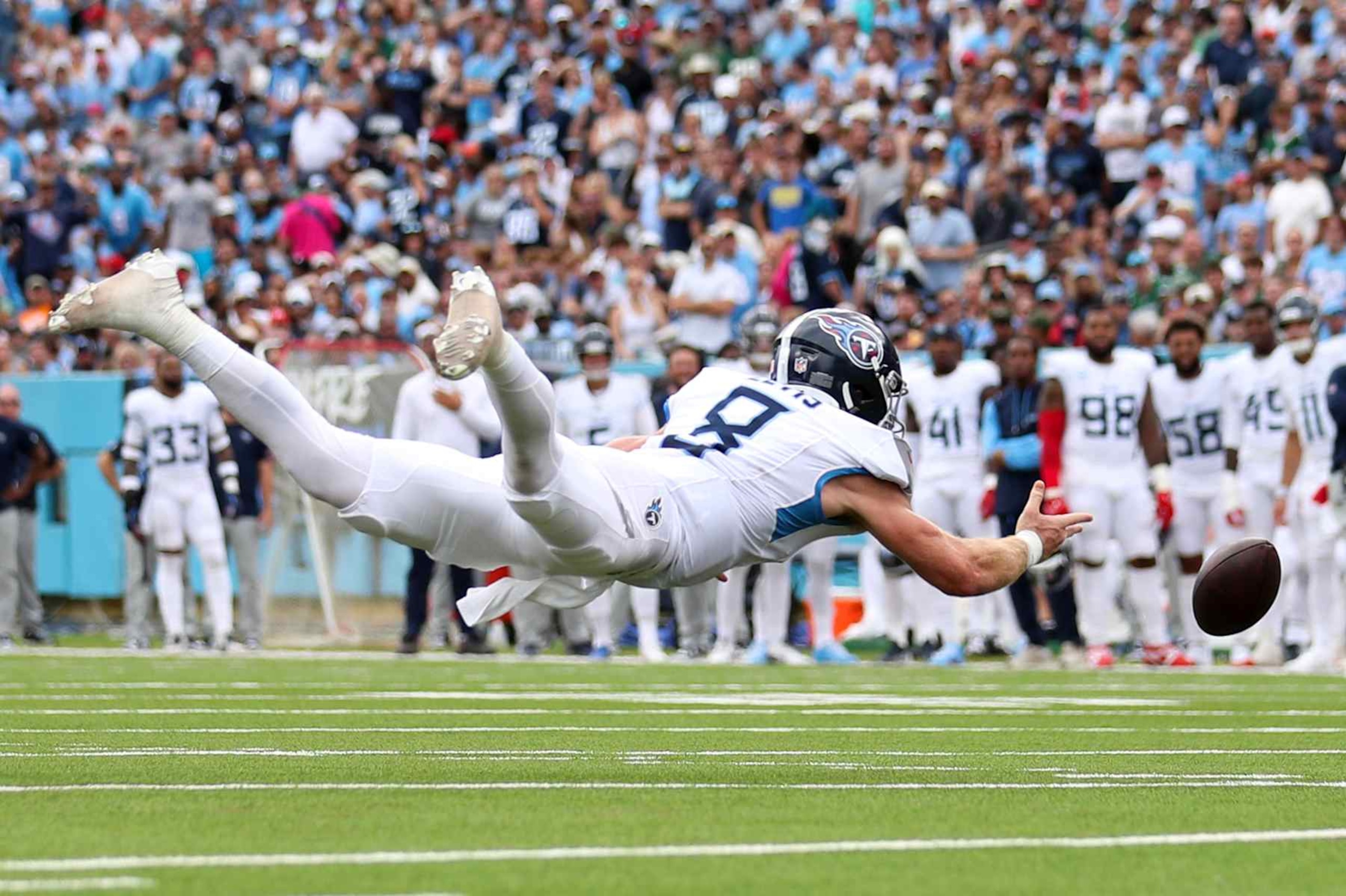 NASHVILLE, TENNESSEE - SEPTEMBER 15: Will Levis #8 of the Tennessee Titans fumbles the ball during the first half against the New York Jets at Nissan Stadium on September 15, 2024 in Nashville, Tennessee. (Photo by Justin Ford/Getty Images)