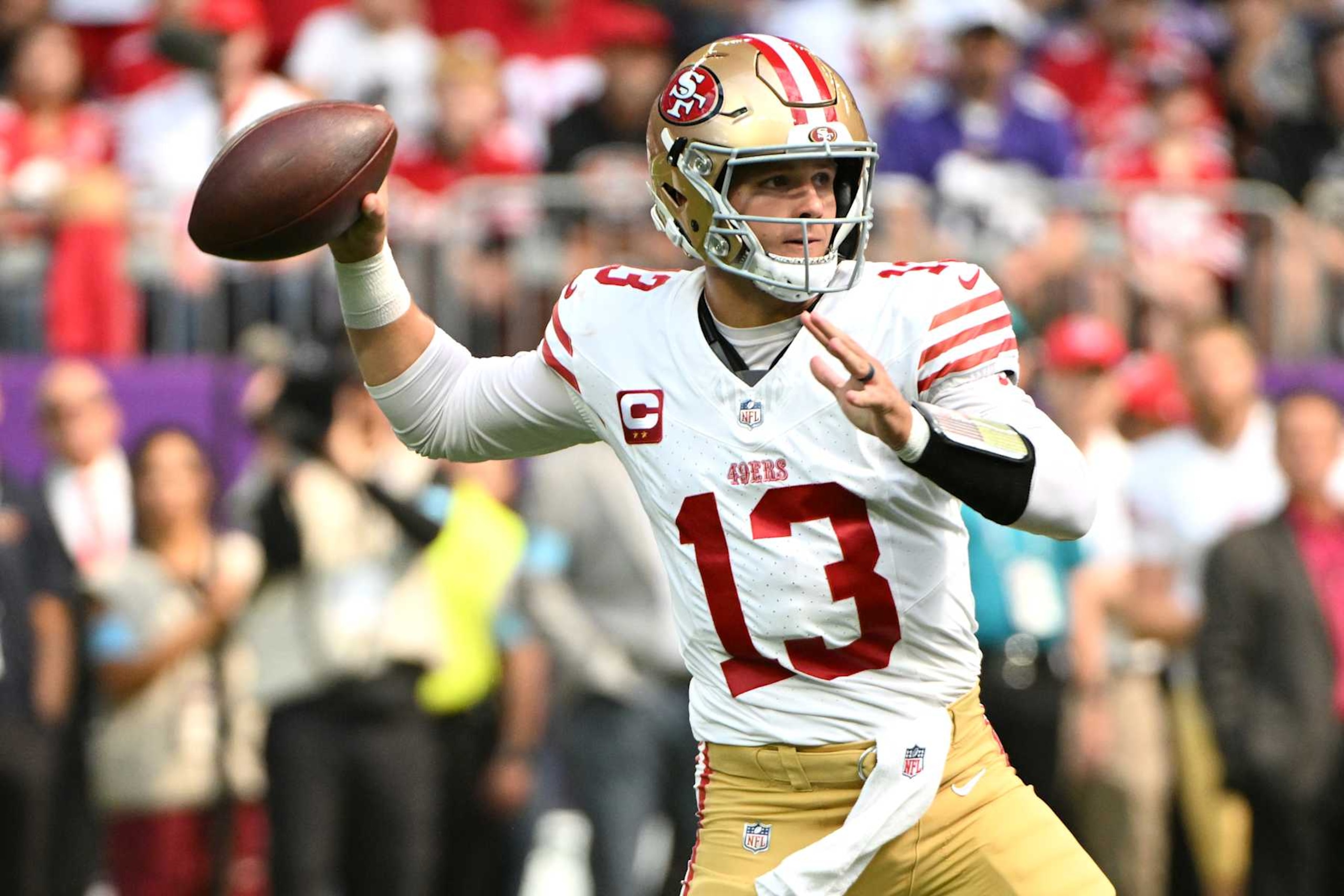 MINNEAPOLIS, MINNESOTA - SEPTEMBER 15: Quarterback Brock Purdy #13 of the San Francisco 49ers throws a pass against the Minnesota Vikings during the first quarter at U.S. Bank Stadium on September 15, 2024 in Minneapolis, Minnesota. (Photo by Stephen Maturen/Getty Images)