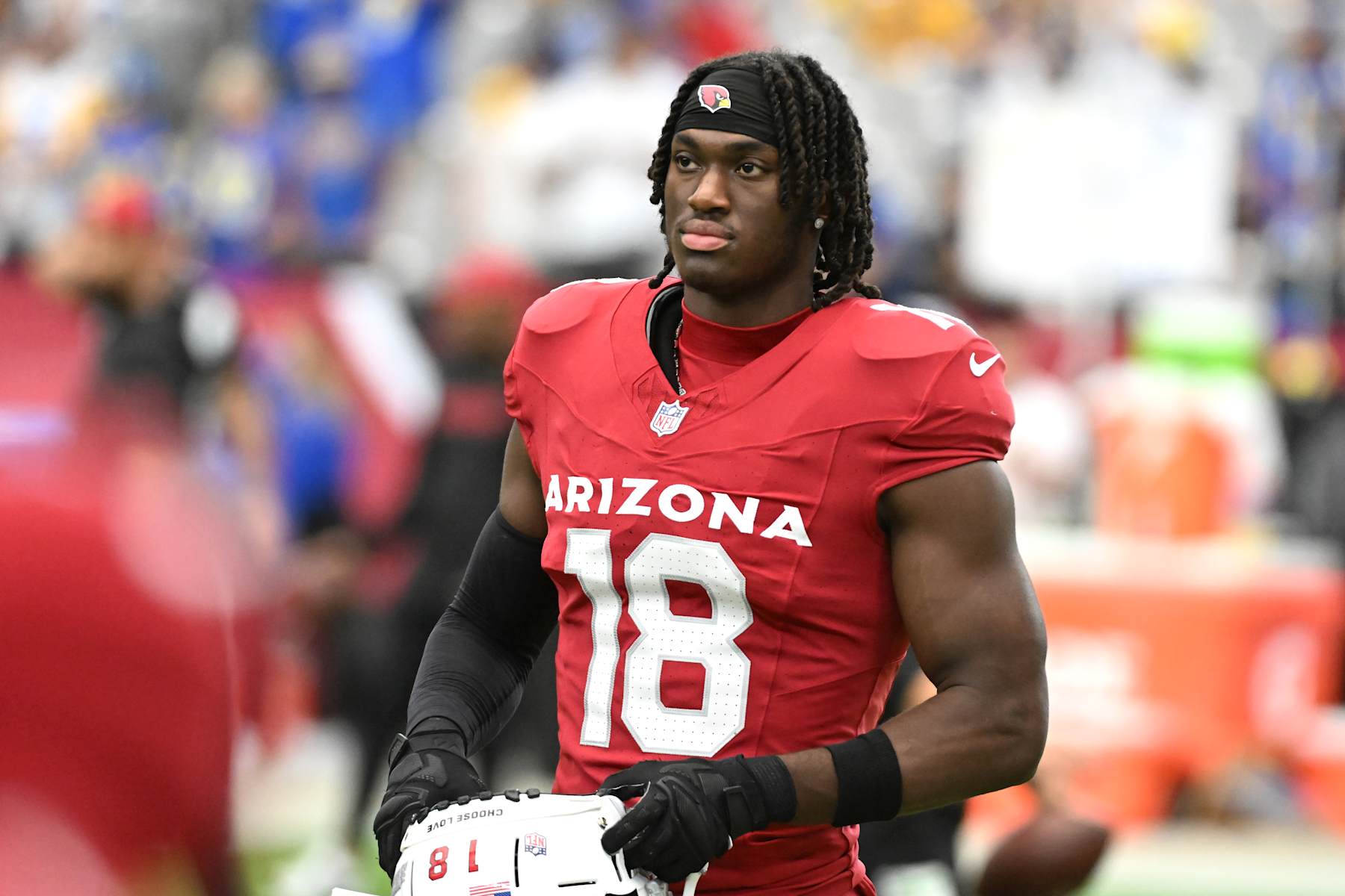 GLENDALE, ARIZONA - SEPTEMBER 15: Wide receiver Marvin Harrison Jr. #18 of the Arizona Cardinals warms up prior to a game against the Los Angeles Rams at State Farm Stadium on September 15, 2024 in Glendale, Arizona. (Photo by Norm Hall/Getty Images)