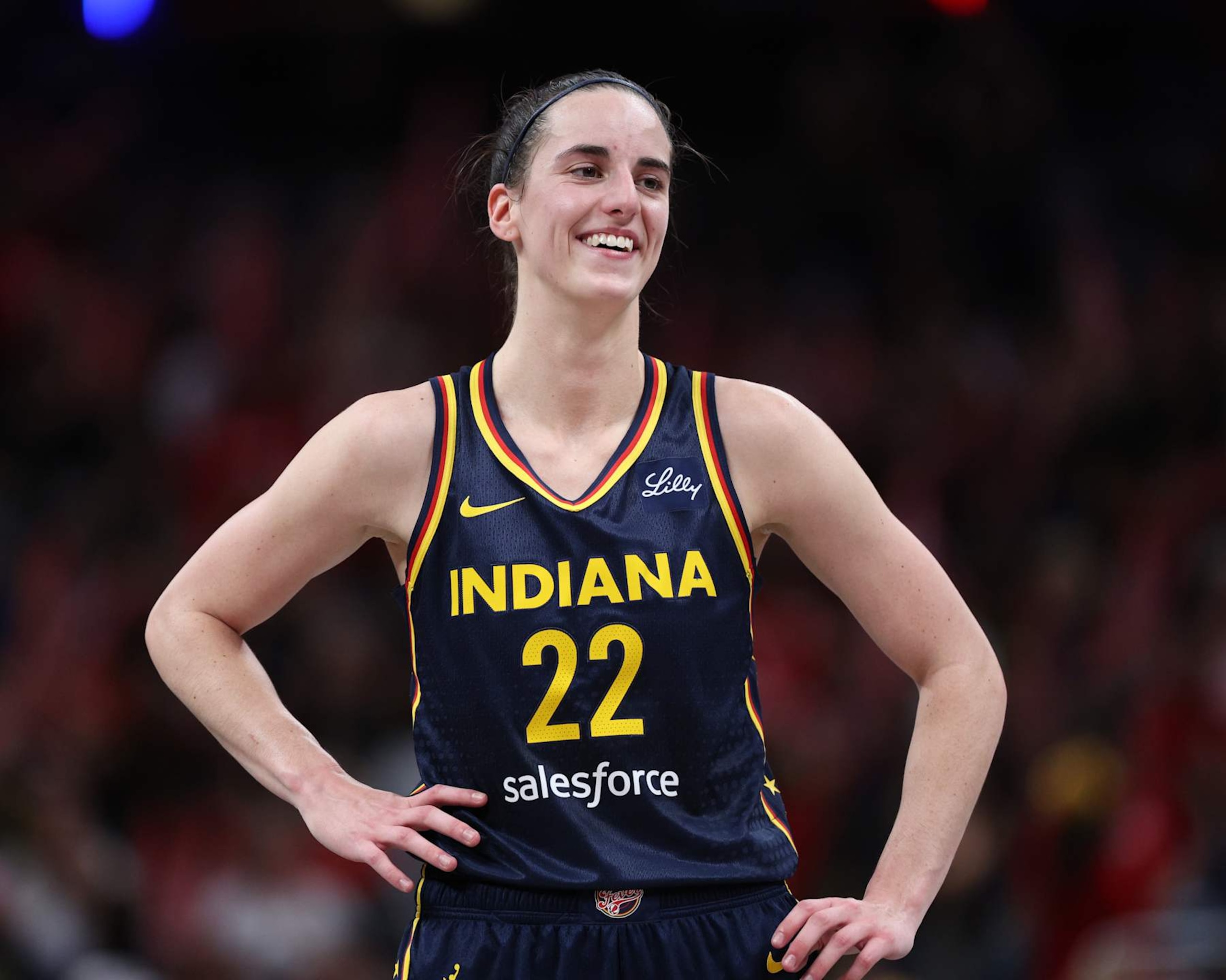 INDIANAPOLIS, IN - SEPTEMBER 15: Caitlin Clark #22 of the Indiana Fever smiles during the game against the Dallas Wings on September 15, 2024 at Gainbridge Fieldhouse in Indianapolis, Indiana. NOTE TO USER: User expressly acknowledges and agrees that, by downloading and or using this Photograph, user is consenting to the terms and conditions of the Getty Images License Agreement. Mandatory Copyright Notice: Copyright 2024 NBAE (Photo by Michael Hickey/NBAE via Getty Images)