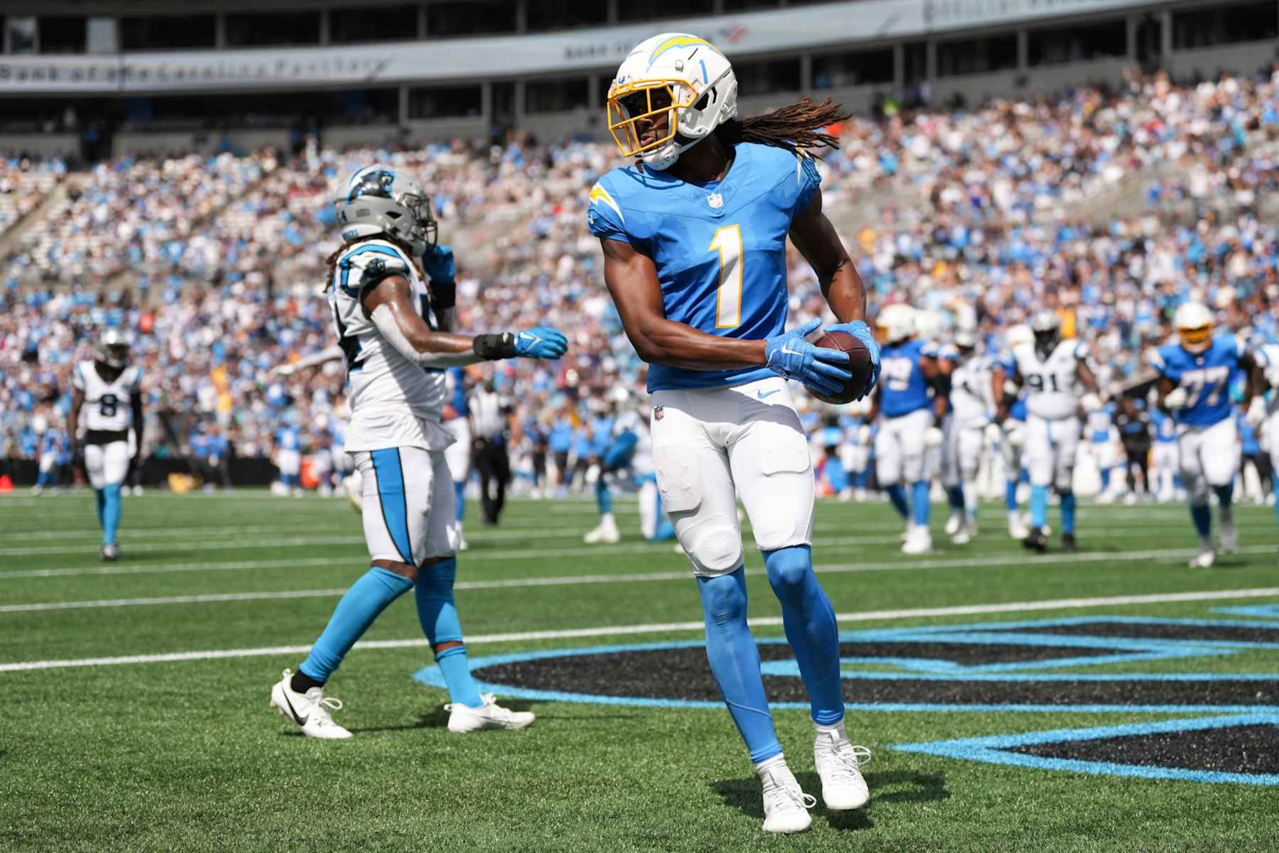 CHARLOTTE, NORTH CAROLINA - SEPTEMBER 15: Quentin Johnston #1 of the Los Angeles Chargers scores a second quarter touchdown against the Carolina Panthers at Bank of America Stadium on September 15, 2024 in Charlotte, North Carolina. (Photo by Grant Halverson/Getty Images)
