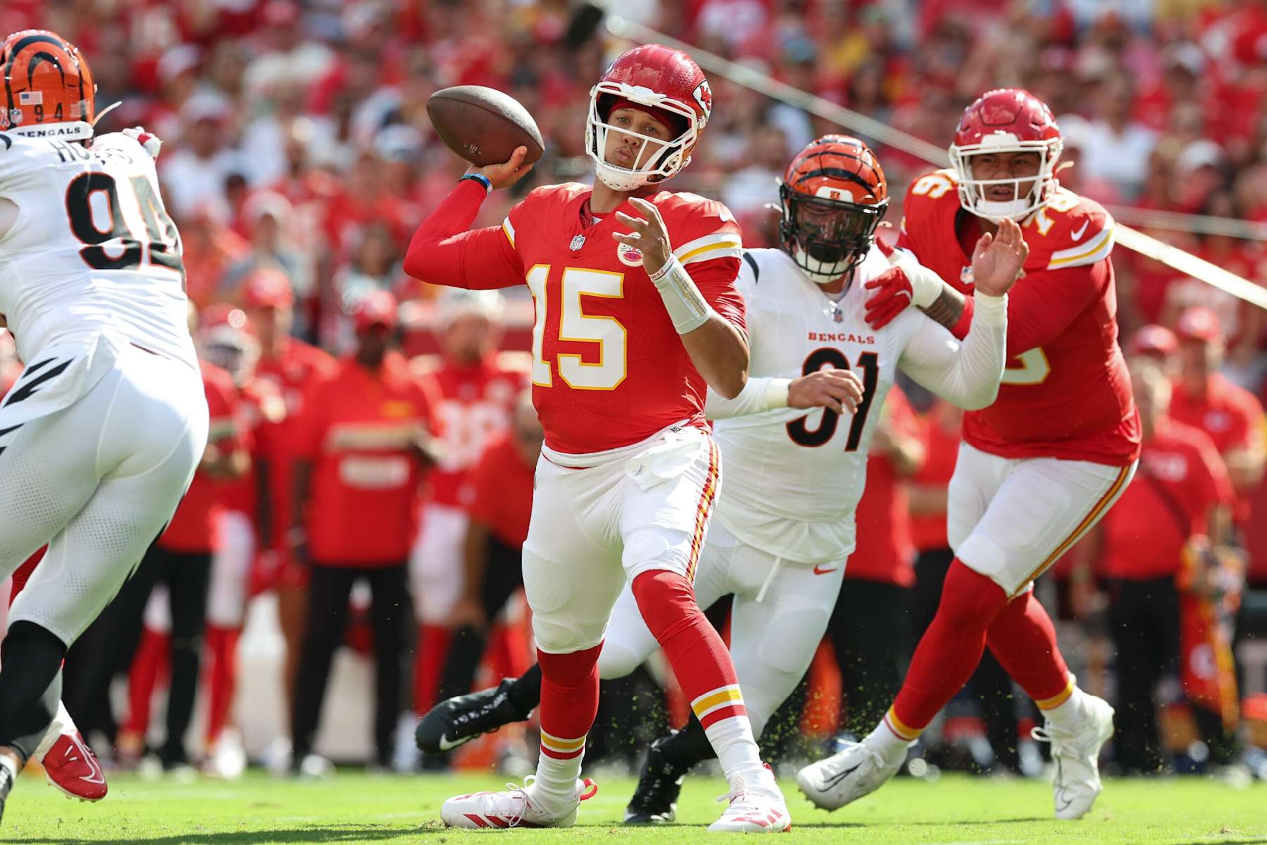 KANSAS CITY, MISSOURI - SEPTEMBER 15: Quarterback Patrick Mahomes #15 of the Kansas City Chiefs throws a pass against the Cincinnati Bengals during the first quarter at GEHA Field at Arrowhead Stadium on September 15, 2024 in Kansas City, Missouri. (Photo by Jamie Squire/Getty Images)