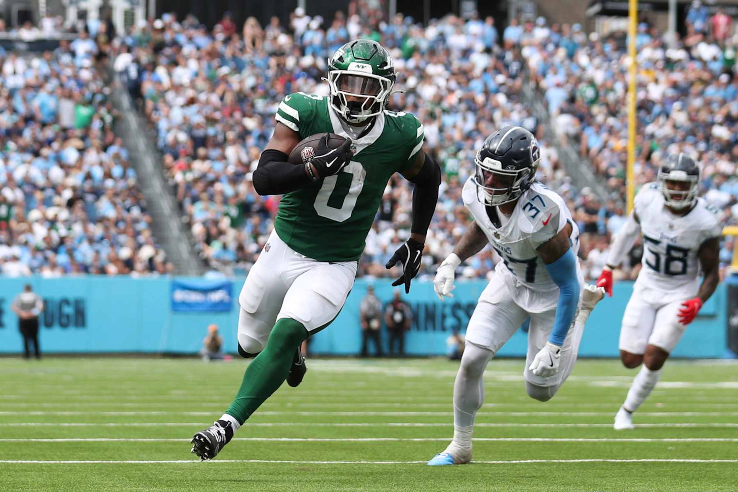 NASHVILLE, TENNESSEE - SEPTEMBER 15: Braelon Allen #0 of the New York Jets scores a second half touchdown against the Tennessee Titans at Nissan Stadium on September 15, 2024 in Nashville, Tennessee. (Photo by Justin Ford/Getty Images) NASHVILLE, TENNESSEE - SEPTEMBER 15: Braelon Allen #0 of the New York Jets scores a second half touchdown against the Tennessee Titans at Nissan Stadium on September 15, 2024 in Nashville, Tennessee. (Photo by Justin Ford/Getty Images)