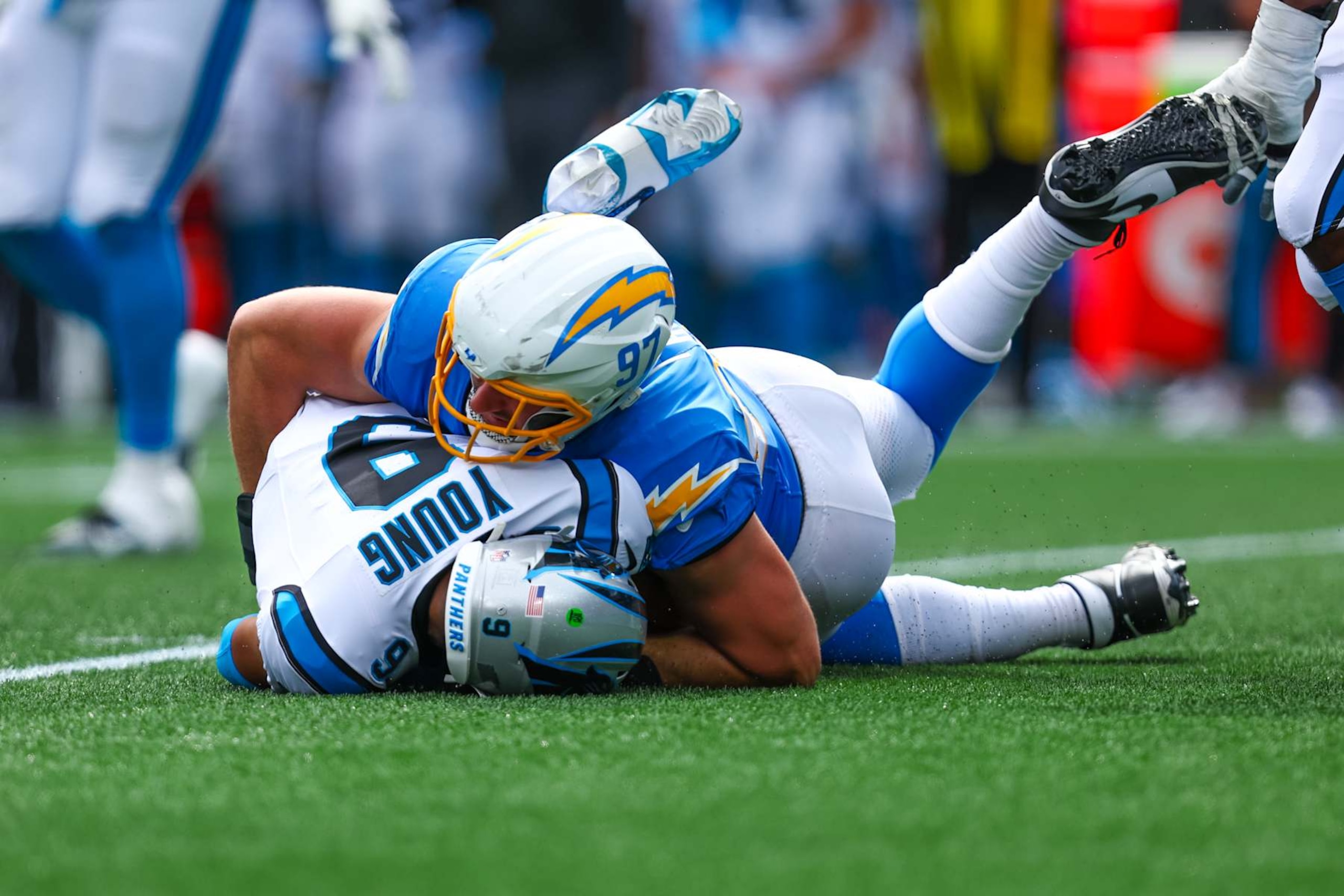 CHARLOTTE, NC - SEPTEMBER 15: Joey Bosa #97 of the Los Angeles Chargers sacks Bryce Young #9 of the Carolina Panthers during a football game at Bank of America Stadium on September 15, 2024 in Charlotte, North Carolina. (Photo by David Jensen/Icon Sportswire via Getty Images))