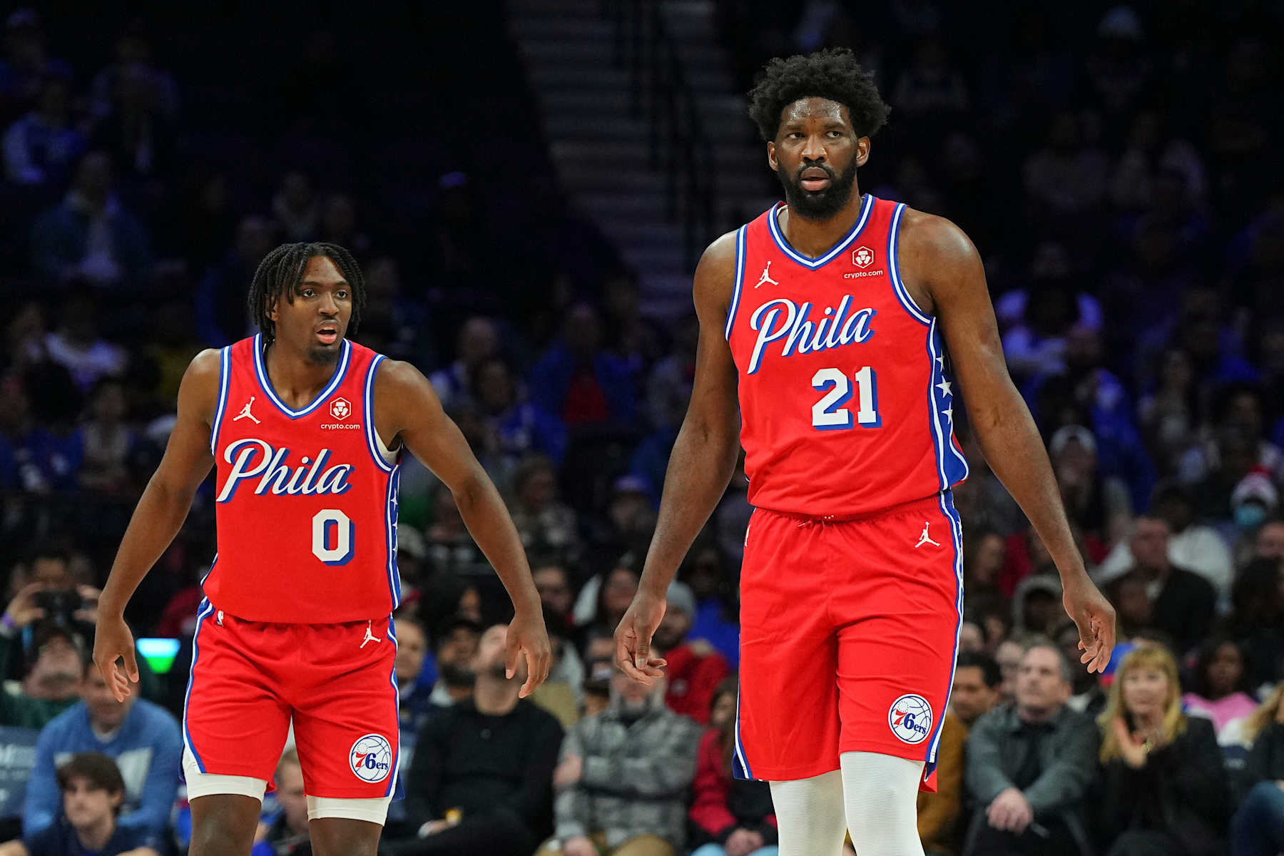 PHILADELPHIA, PENNSYLVANIA - DECEMBER 8: Tyrese Maxey #0 and Joel Embiid #21 of the Philadelphia 76ers look on against the Atlanta Hawks at the Wells Fargo Center on December 8, 2023 in Philadelphia, Pennsylvania. NOTE TO USER: User expressly acknowledges and agrees that, by downloading and or using this photograph, User is consenting to the terms and conditions of the Getty Images License Agreement. (Photo by Mitchell Leff/Getty Images)