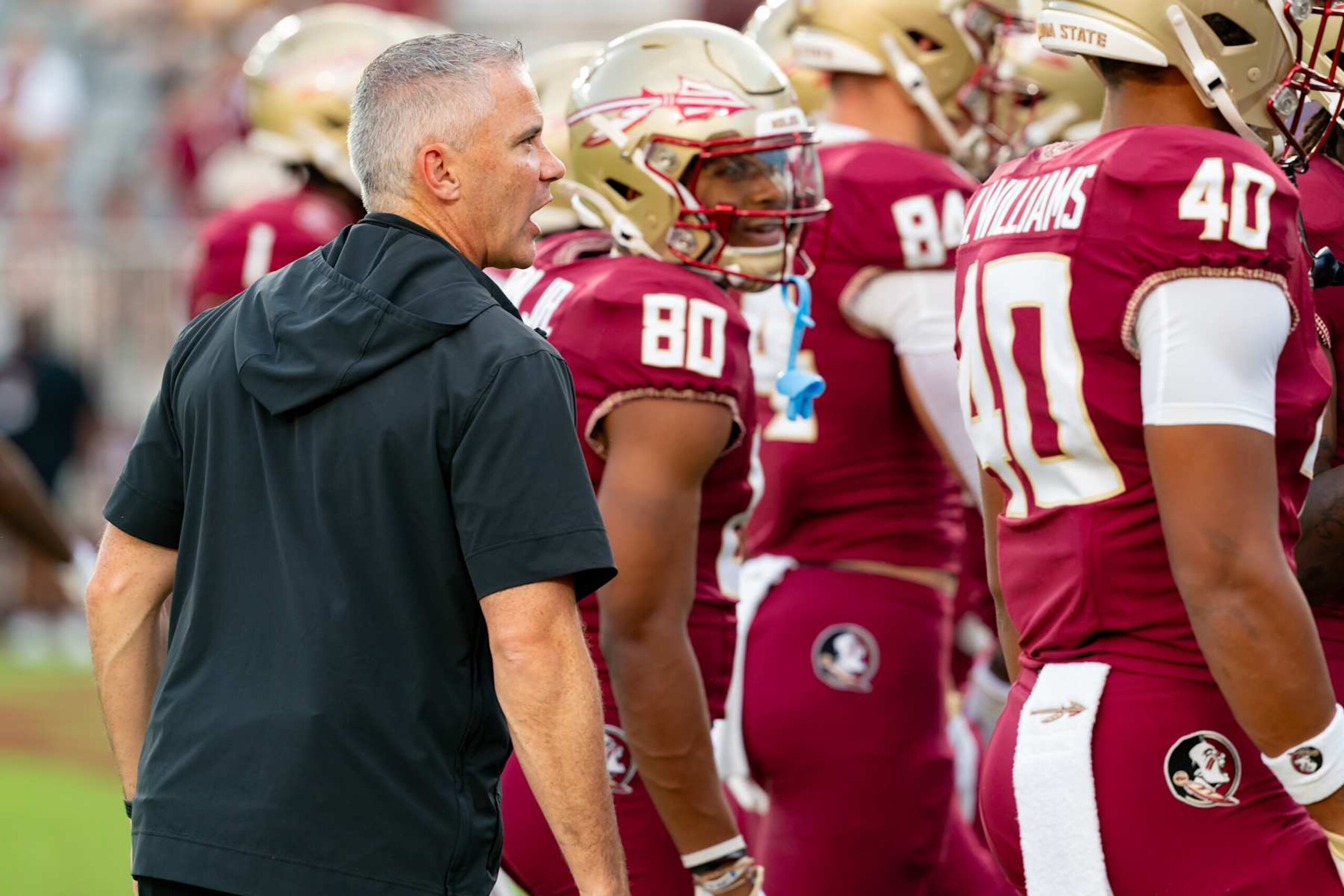 TALLAHASSEE, FL - SEPTEMBER 02: Florida State Seminoles head coach Mike Norvell talks with his team before a college football game between the Boston College Eagles and the Florida State Seminoles on September 2nd, 2024 at Doak Campbell Stadium in Tallahassee, FL. (Photo by Chris Leduc/Icon Sportswire via Getty Images) TALLAHASSEE, FL - SEPTEMBER 02: Florida State Seminoles head coach Mike Norvell talks with his team before a college football game between the Boston College Eagles and the Florida State Seminoles on September 2nd, 2024 at Doak Campbell Stadium in Tallahassee, FL. (Photo by Chris Leduc/Icon Sportswire via Getty Images)