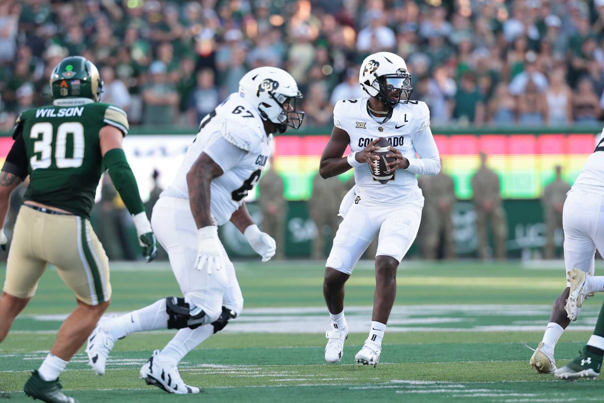 FORT COLLINS, COLORADO - SEPTEMBER 14: Shedeur Sanders #2 of the Colorado Buffaloes looks to pass during the first quarter against the Colorado State Rams at Canvas Stadium on September 14, 2024 in Fort Collins, Colorado. (Photo by Andrew Wevers/Getty Images) FORT COLLINS, COLORADO - SEPTEMBER 14: Shedeur Sanders #2 of the Colorado Buffaloes looks to pass during the first quarter against the Colorado State Rams at Canvas Stadium on September 14, 2024 in Fort Collins, Colorado. (Photo by Andrew Wevers/Getty Images)