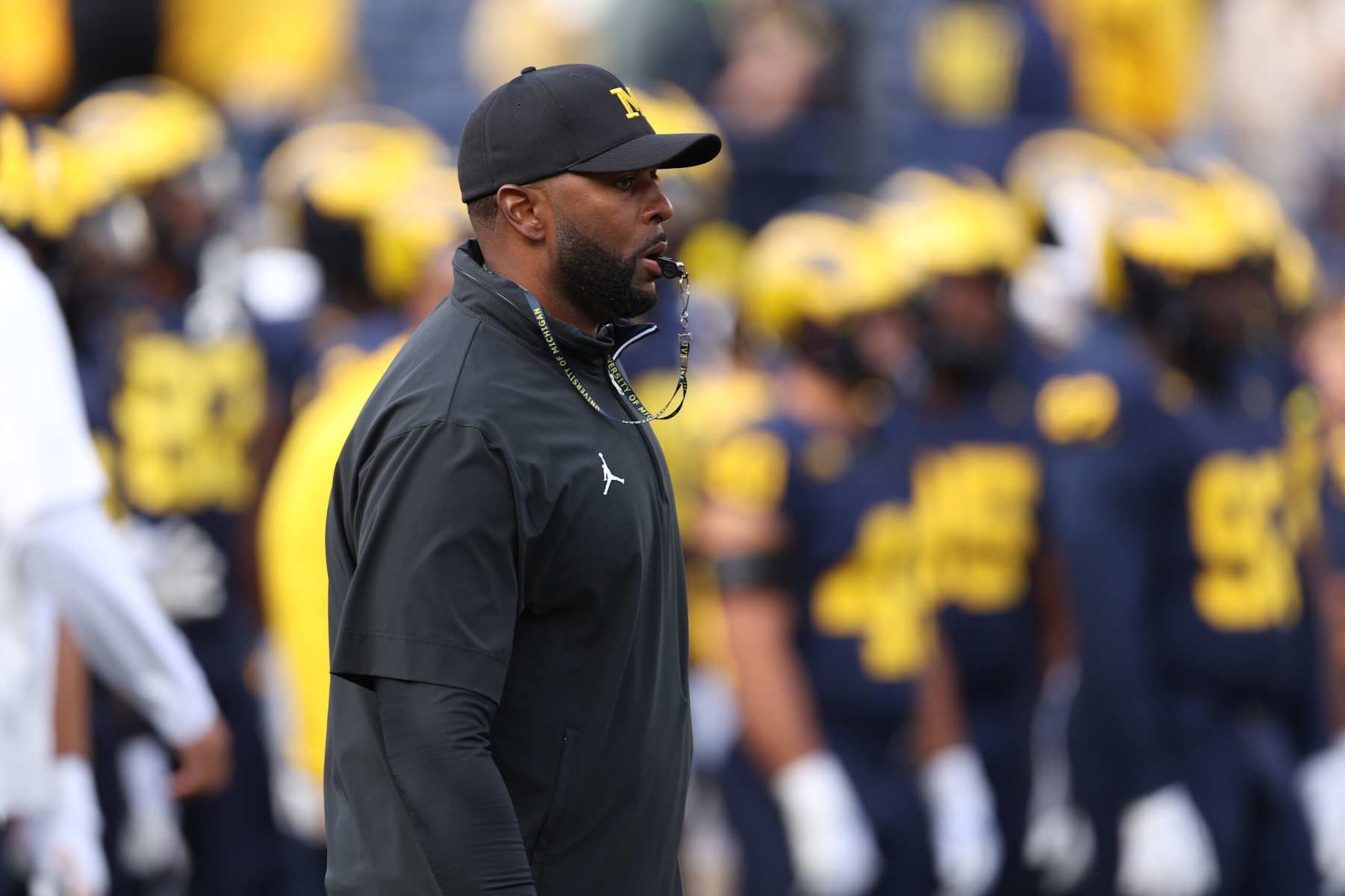 ANN ARBOR, MICHIGAN - SEPTEMBER 07: Head coach Sherrone Moore of the Michigan Wolverines is seen on the field during warmups prior to a game against the Texas Longhorns at Michigan Stadium on September 07, 2024 in Ann Arbor, Michigan. (Photo by Gregory Shamus/Getty Images)