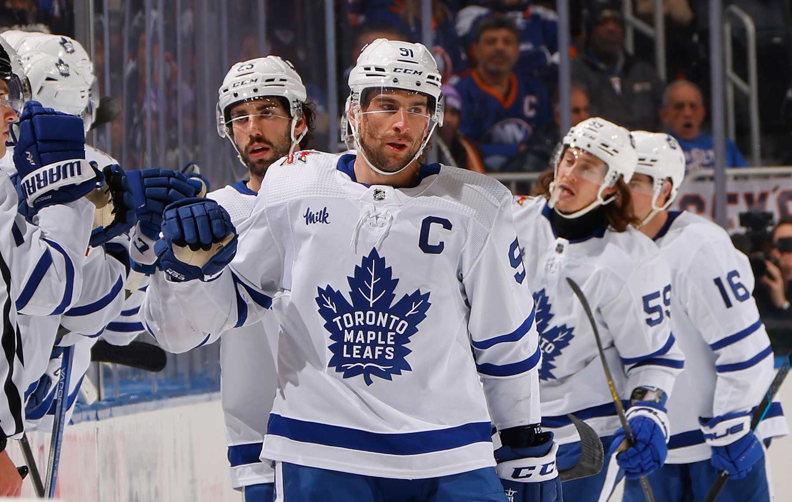 ELMONT, NEW YORK - DECEMBER 11: John Tavares #91 of the Toronto Maple Leafs celebrates his goal at 7:43 of the second period against the New York Islanders at UBS Arena on December 11, 2023 in Elmont, New York. The point was the 999th of his NHL career. (Photo by Bruce Bennett/Getty Images) ELMONT, NEW YORK - DECEMBER 11: John Tavares #91 of the Toronto Maple Leafs celebrates his goal at 7:43 of the second period against the New York Islanders at UBS Arena on December 11, 2023 in Elmont, New York. The point was the 999th of his NHL career. (Photo by Bruce Bennett/Getty Images)