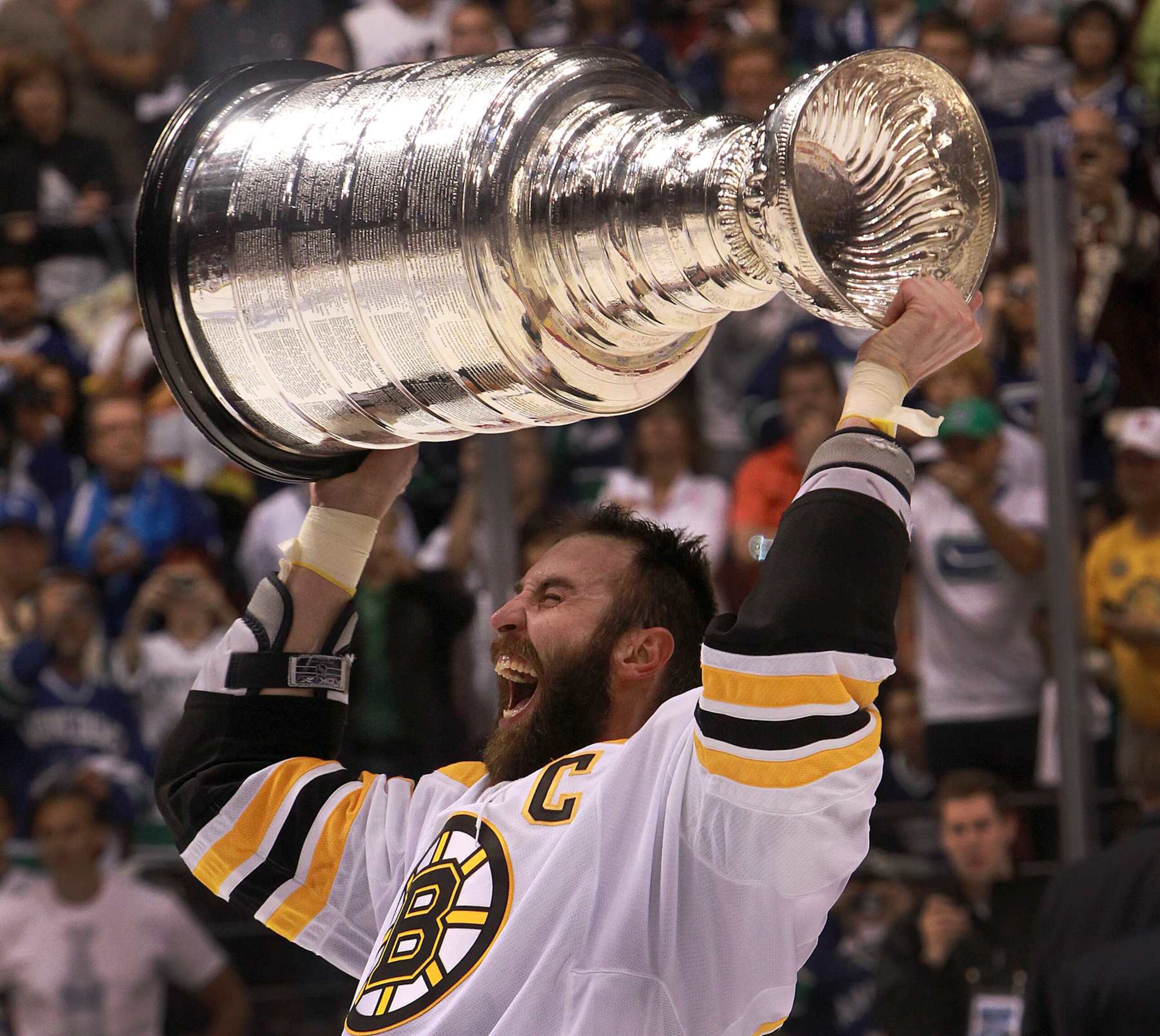 VANCOUVER - JUNE 15: Boston Bruins defenseman Zdeno Chara (#33) hoists the Stanley Cup Trophy. The Boston Bruins took on the Vancouver Canucks in Game 7 of the NHL Stanley Cup Finals at Rogers Arena in Vancouver. (Photo by Barry Chin/The Boston Globe via Getty Images) VANCOUVER - JUNE 15: Boston Bruins defenseman Zdeno Chara (#33) hoists the Stanley Cup Trophy. The Boston Bruins took on the Vancouver Canucks in Game 7 of the NHL Stanley Cup Finals at Rogers Arena in Vancouver. (Photo by Barry Chin/The Boston Globe via Getty Images)