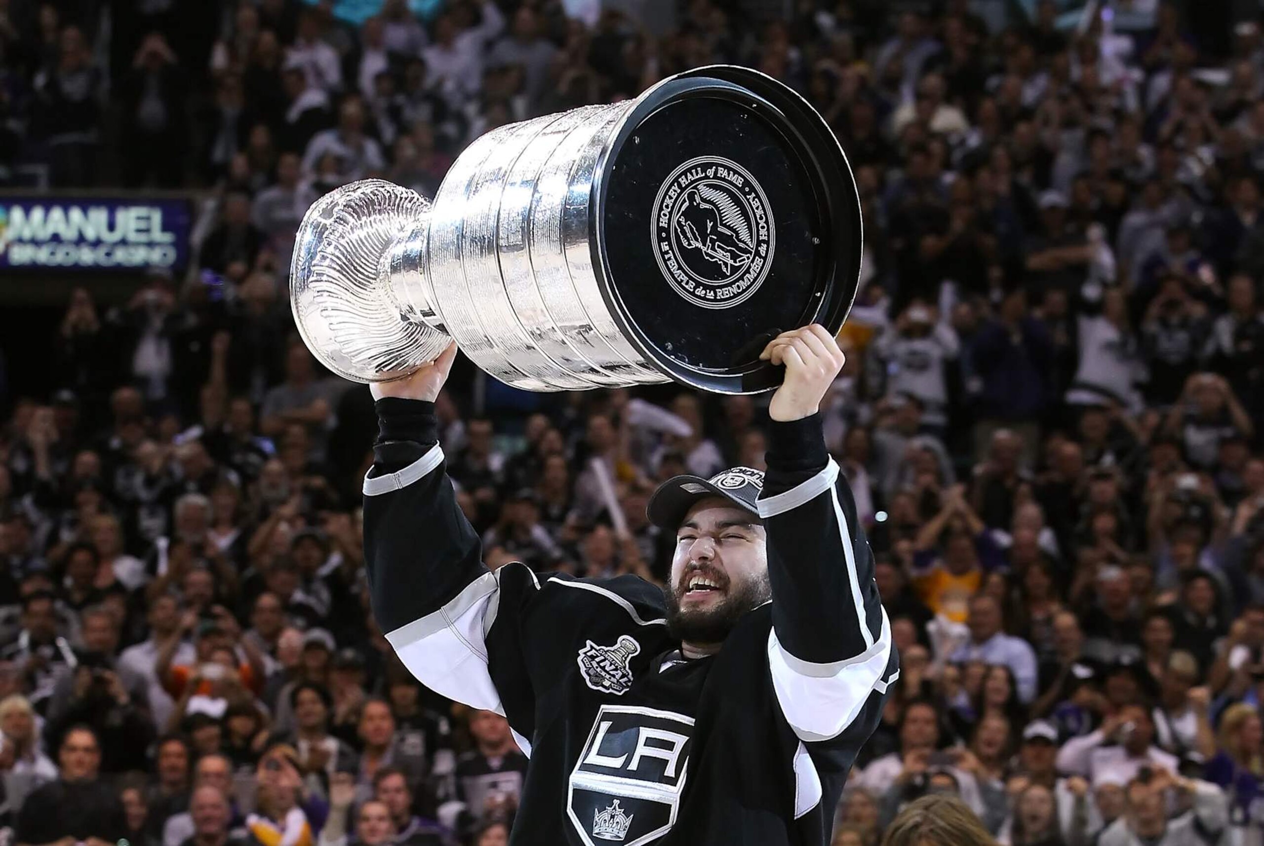 LOS ANGELES, CA - JUNE 11: Drew Doughty #8 of the Los Angeles Kings hoists the Stanley Cup in celebration after defeating the New Jersey Devils in Game Six of the 2012 Stanley Cup Finals at Staples Center on June 11, 2012 in Los Angeles, California. The Kings defeated the Devils 6-1 to win the series 4 games to 2. (Photo by Christian Petersen/Getty Images) LOS ANGELES, CA - JUNE 11: Drew Doughty #8 of the Los Angeles Kings hoists the Stanley Cup in celebration after defeating the New Jersey Devils in Game Six of the 2012 Stanley Cup Finals at Staples Center on June 11, 2012 in Los Angeles, California. The Kings defeated the Devils 6-1 to win the series 4 games to 2. (Photo by Christian Petersen/Getty Images)