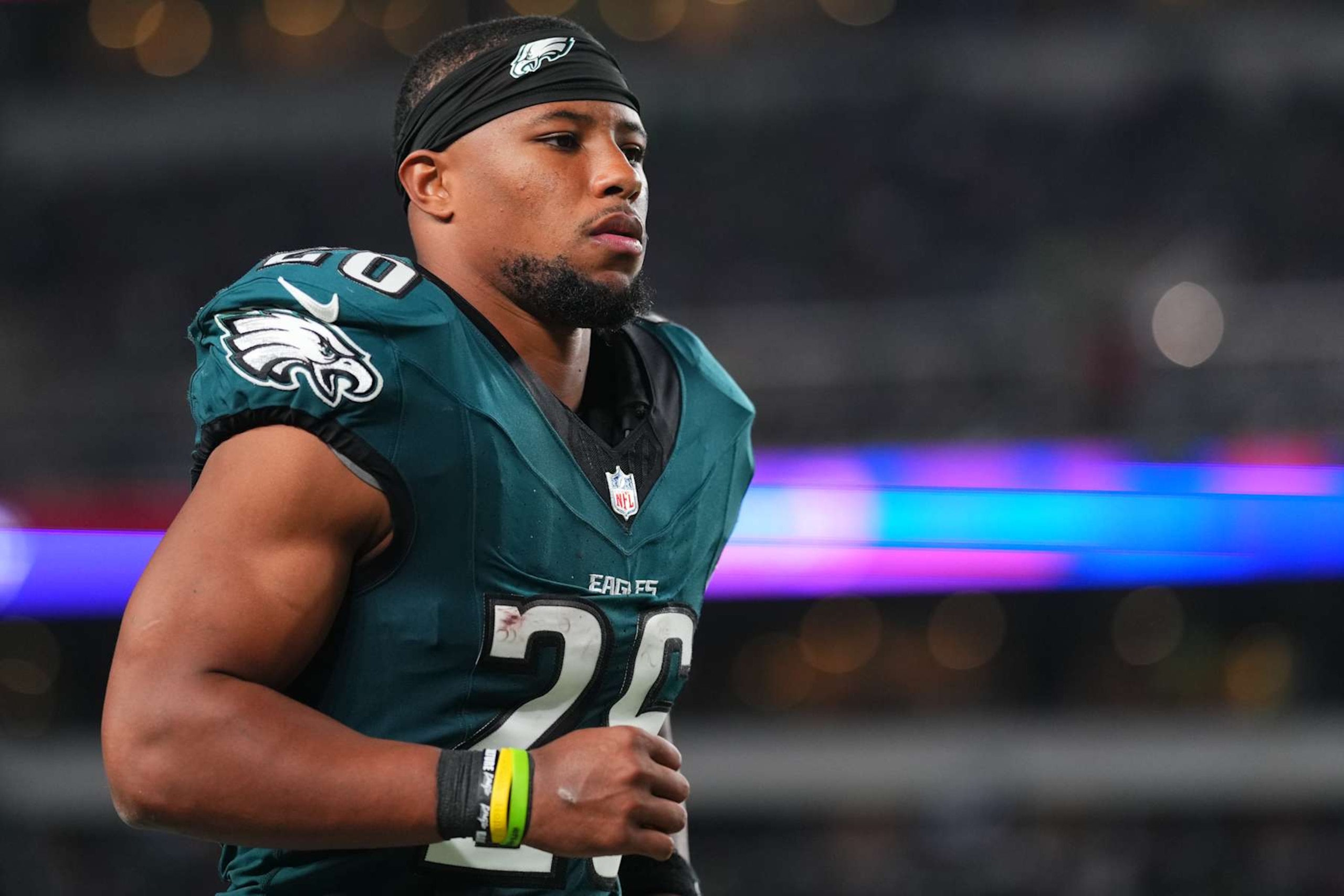 PHILADELPHIA, PA - SEPTEMBER 16: Saquon Barkley #26 of the Philadelphia Eagles jogs off the field at halftime against the Atlanta Falcons during a football game at Lincoln Financial Field on September 16, 2024 in Philadelphia, Pennsylvania. (Photo by Cooper Neill/Getty Images)