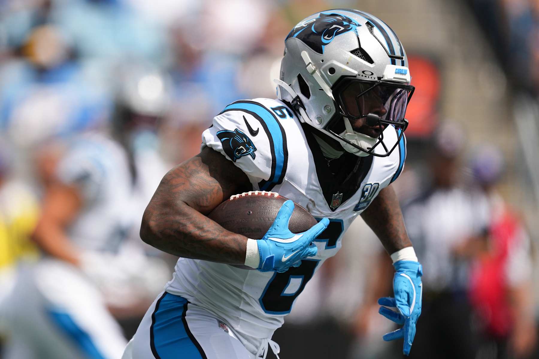 CHARLOTTE, NORTH CAROLINA - SEPTEMBER 15: Miles Sanders #6 of the Carolina Panthers runs with the ball during the first quarter against the Los Angeles Chargers at Bank of America Stadium on September 15, 2024 in Charlotte, North Carolina. (Photo by Grant Halverson/Getty Images)