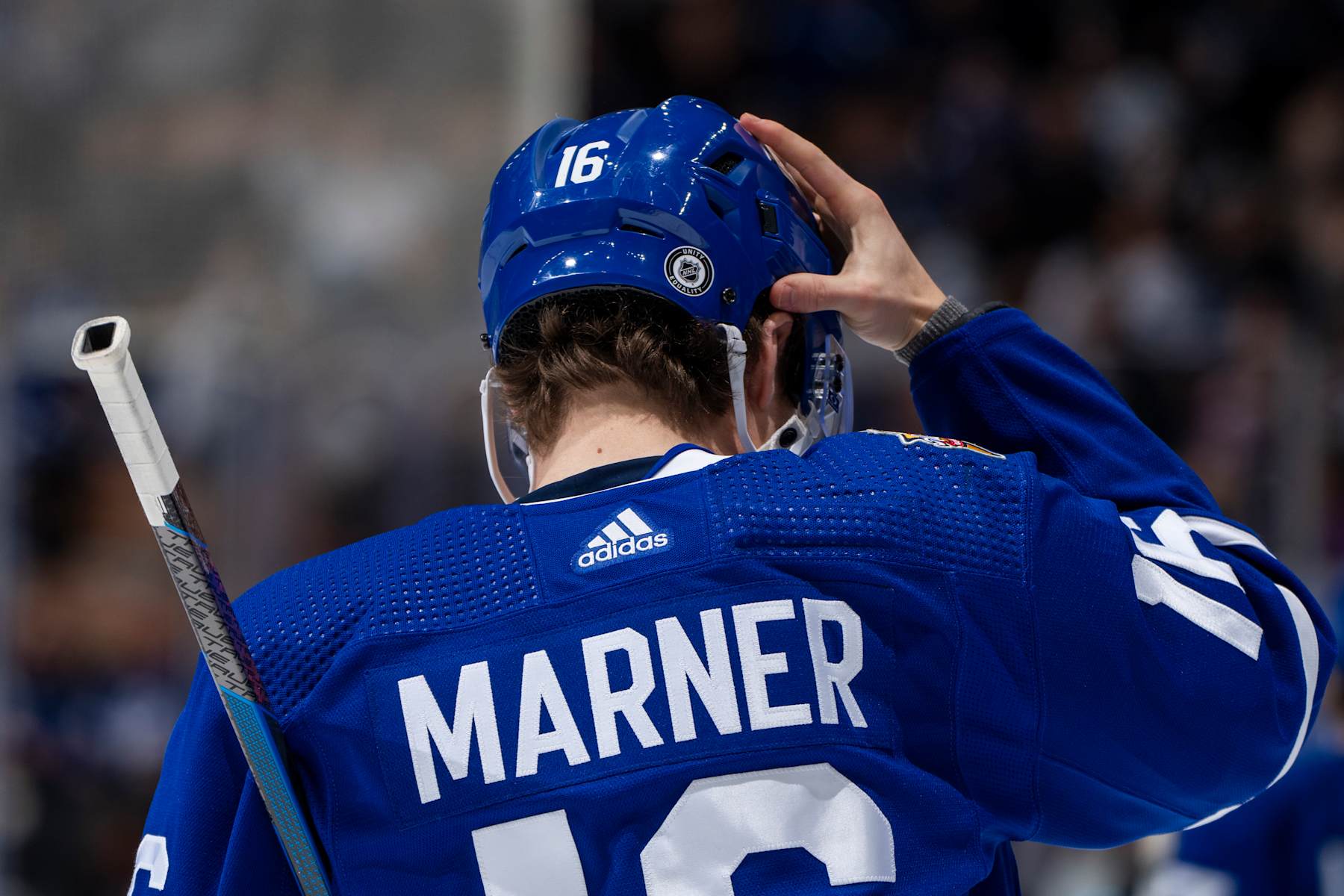 TORONTO, ON - JANUARY 9: Mitchell Marner #16 of the Toronto Maple Leafs adjusts his helmet during the third  period against the San Jose Sharks at Scotiabank Arena on January 9, 2024 in Toronto, Ontario, Canada. (Photo by Kevin Sousa/NHLI via Getty Images)