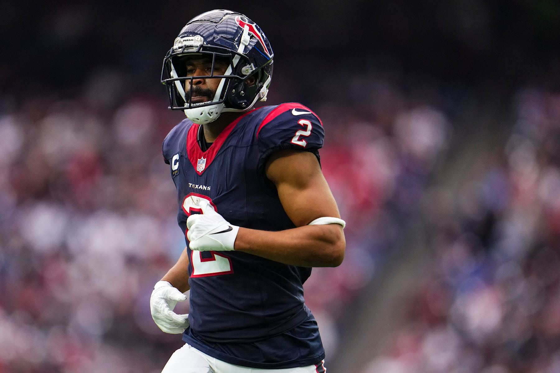 HOUSTON, TX - DECEMBER 31: Robert Woods #2 of the Houston Texans runs across the field during an NFL football game against the Tennessee Titans at NRG Stadium on December 31, 2023 in Houston, Texas. (Photo by Cooper Neill/Getty Images)
