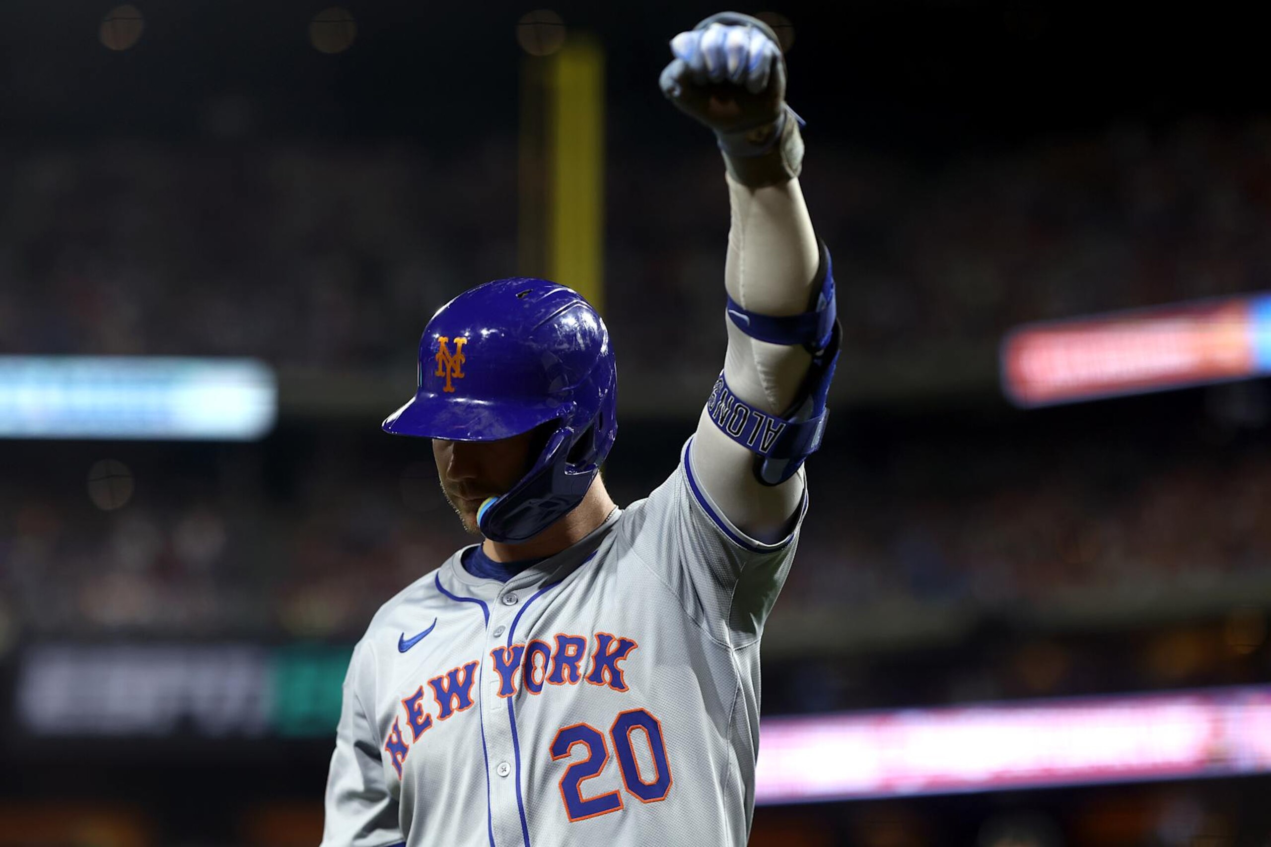 PHILADELPHIA, PENNSYLVANIA - SEPTEMBER 13: Pete Alonso #20 of the New York Mets reacts after a three run home run by Brandon Nimmo #9 during the sixth inning against the Philadelphia Phillies at Citizens Bank Park on September 13, 2024 in Philadelphia, Pennsylvania. (Photo by Tim Nwachukwu/Getty Images)