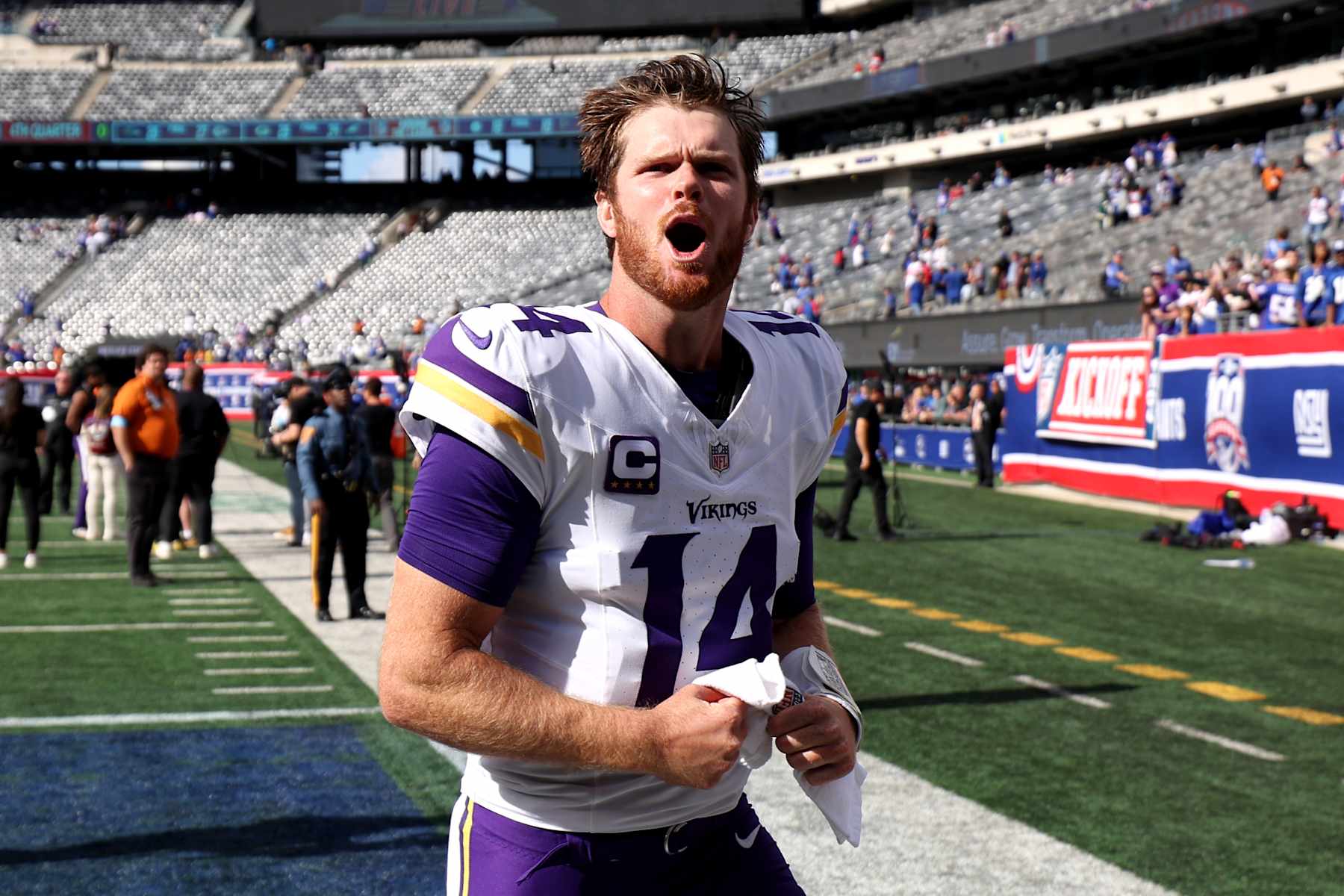EAST RUTHERFORD, NEW JERSEY - SEPTEMBER 08: Sam Darnold #14 of the Minnesota Vikings reacts after defeating the New York Giants at MetLife Stadium on September 08, 2024 in East Rutherford, New Jersey. (Photo by Luke Hales/Getty Images)