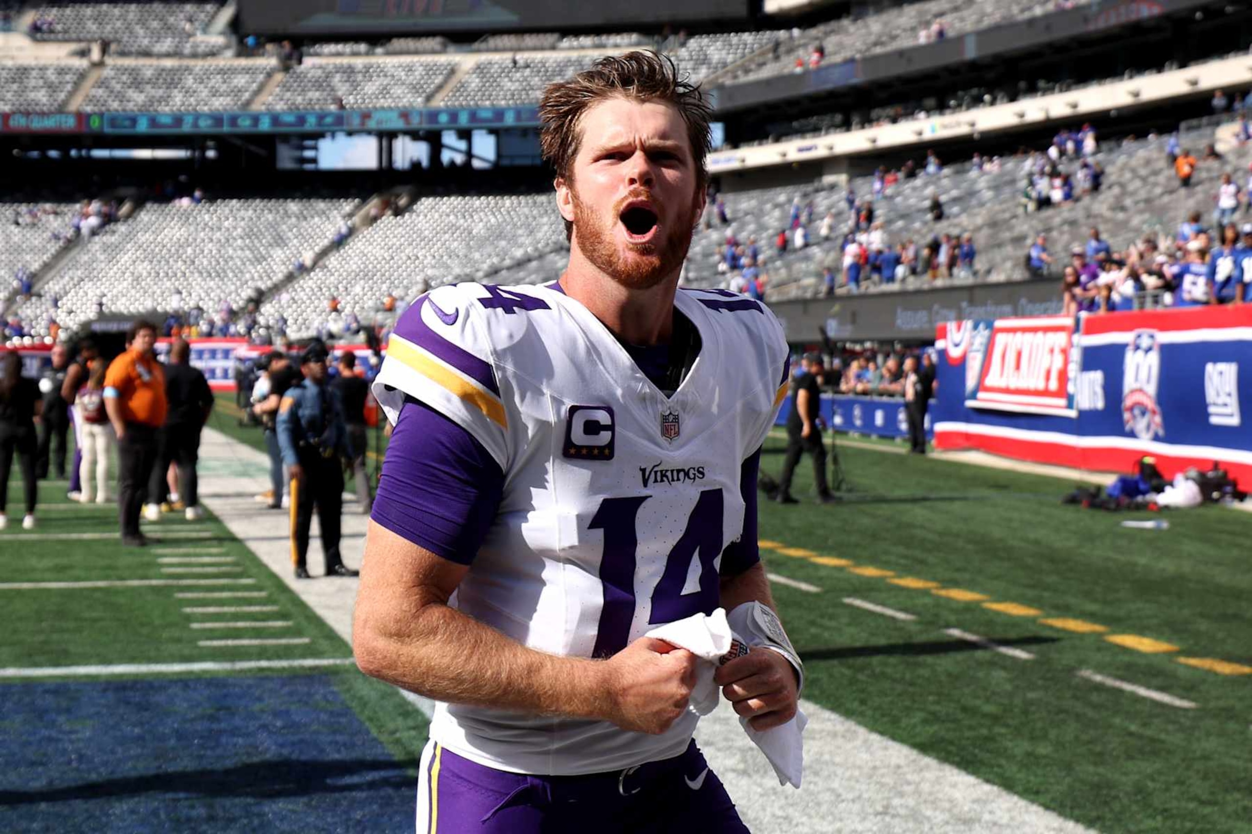 EAST RUTHERFORD, NEW JERSEY - SEPTEMBER 08: Sam Darnold #14 of the Minnesota Vikings reacts after defeating the New York Giants at MetLife Stadium on September 08, 2024 in East Rutherford, New Jersey. (Photo by Luke Hales/Getty Images)