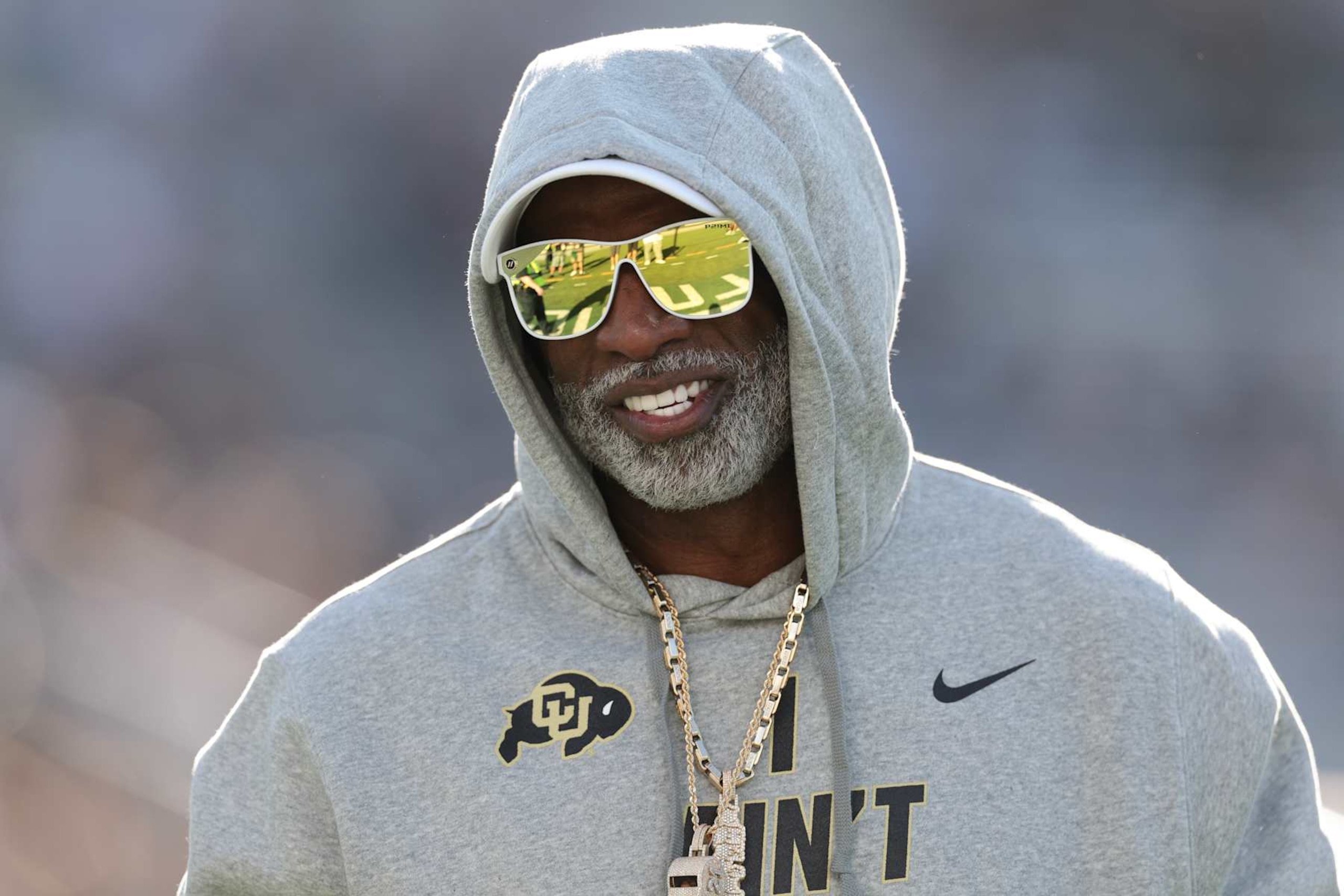 FORT COLLINS, COLORADO - SEPTEMBER 14: Head coach Deion Sanders of the Colorado Buffaloes walks the field prior to the game against the Colorado State Rams at Canvas Stadium on September 14, 2024 in Fort Collins, Colorado. (Photo by Andrew Wevers/Getty Images) FORT COLLINS, COLORADO - SEPTEMBER 14: Head coach Deion Sanders of the Colorado Buffaloes walks the field prior to the game against the Colorado State Rams at Canvas Stadium on September 14, 2024 in Fort Collins, Colorado. (Photo by Andrew Wevers/Getty Images)