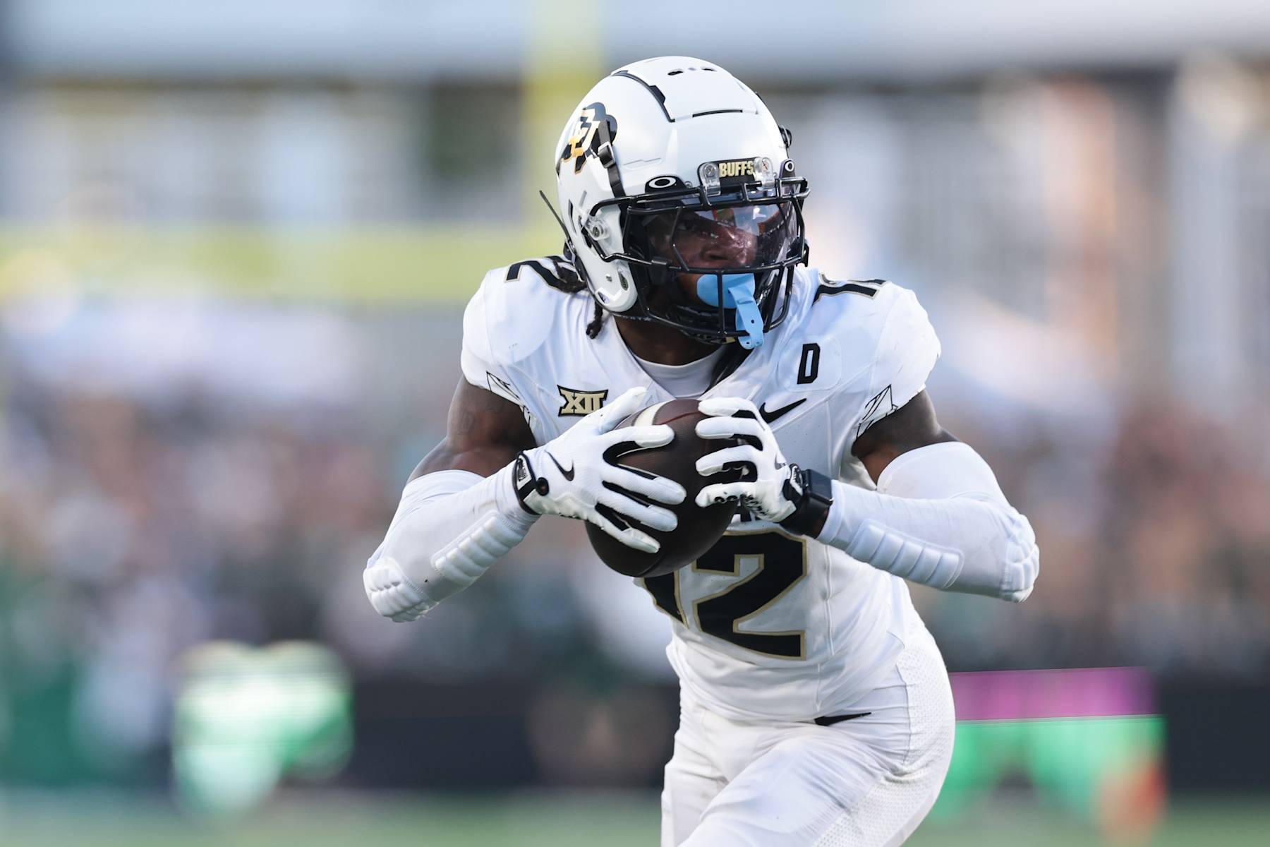 FORT COLLINS, COLORADO - SEPTEMBER 14: Travis Hunter #12 of the Colorado Buffaloes runs with the ball during the second quarter against the Colorado State Rams at Canvas Stadium on September 14, 2024 in Fort Collins, Colorado. (Photo by Andrew Wevers/Getty Images)