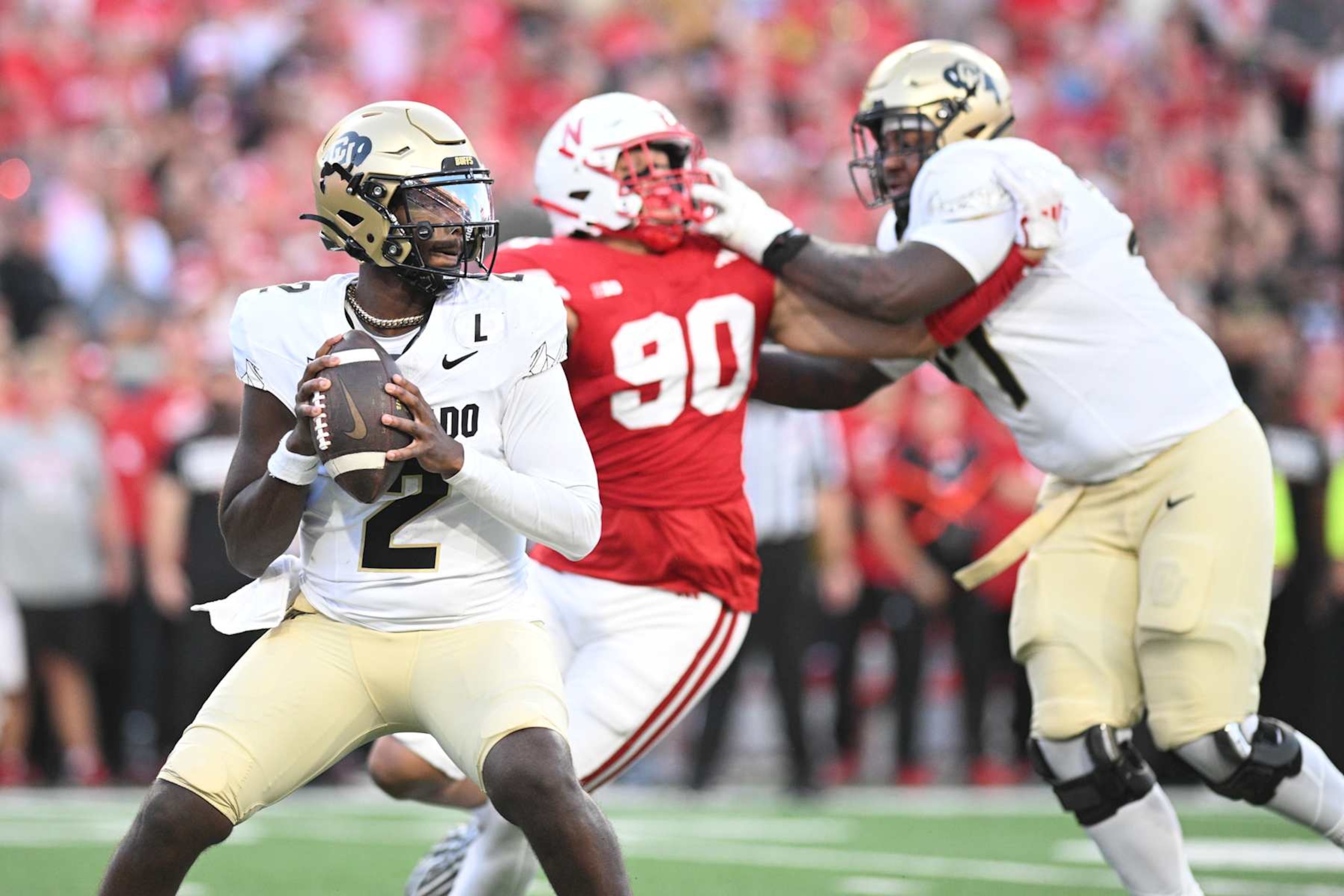 LINCOLN, NEBRASKA - SEPTEMBER 7: Shedeur Sanders #2 of the Colorado Buffaloes drops back to pass against the Nebraska Cornhuskers at Memorial Stadium on September 7, 2024 in Lincoln, Nebraska. (Photo by Steven Branscombe/Getty Images) LINCOLN, NEBRASKA - SEPTEMBER 7: Shedeur Sanders #2 of the Colorado Buffaloes drops back to pass against the Nebraska Cornhuskers at Memorial Stadium on September 7, 2024 in Lincoln, Nebraska. (Photo by Steven Branscombe/Getty Images)