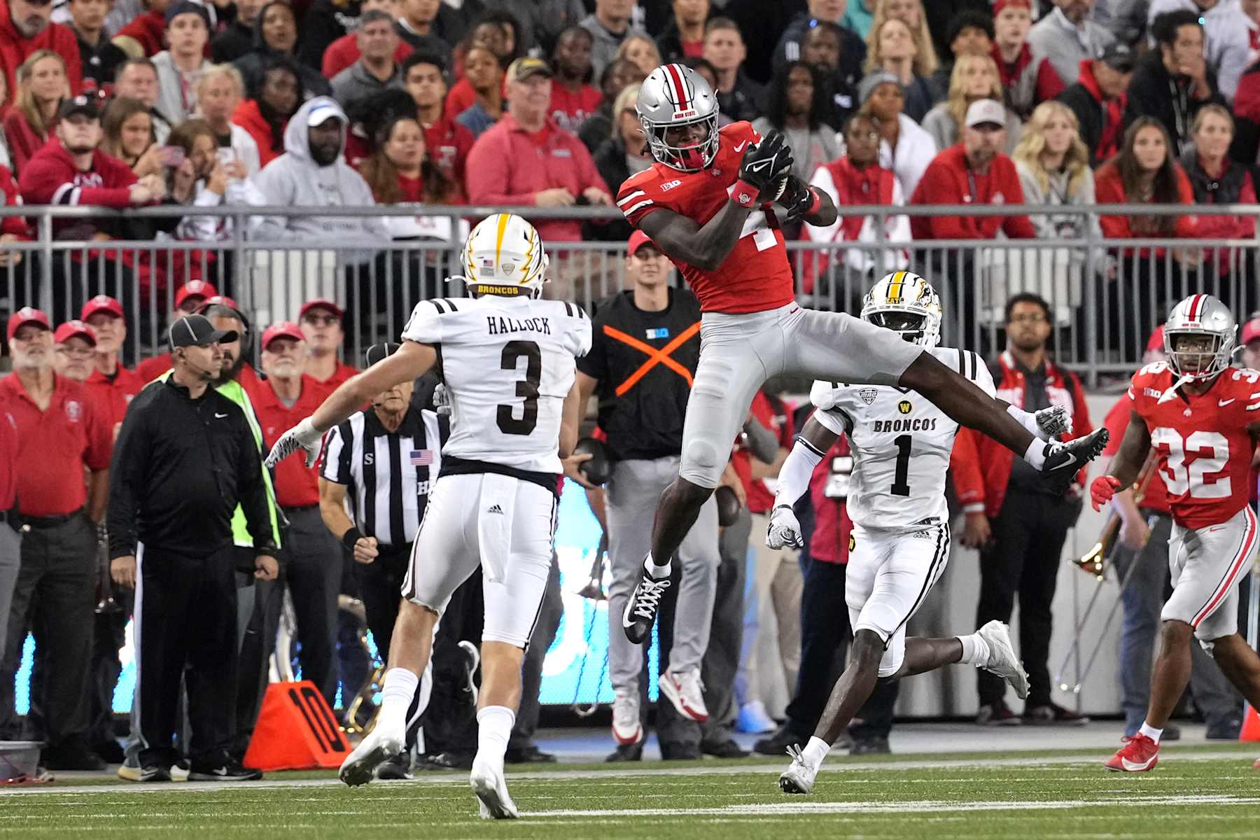 COLUMBUS, OHIO - SEPTEMBER 07: Wide receiver Jeremiah Smith #4 of the Ohio State Buckeyes catches a pass during the second quarter against the Western Michigan Broncos at Ohio Stadium on September 07, 2024 in Columbus, Ohio. (Photo by Jason Mowry/Getty Images)