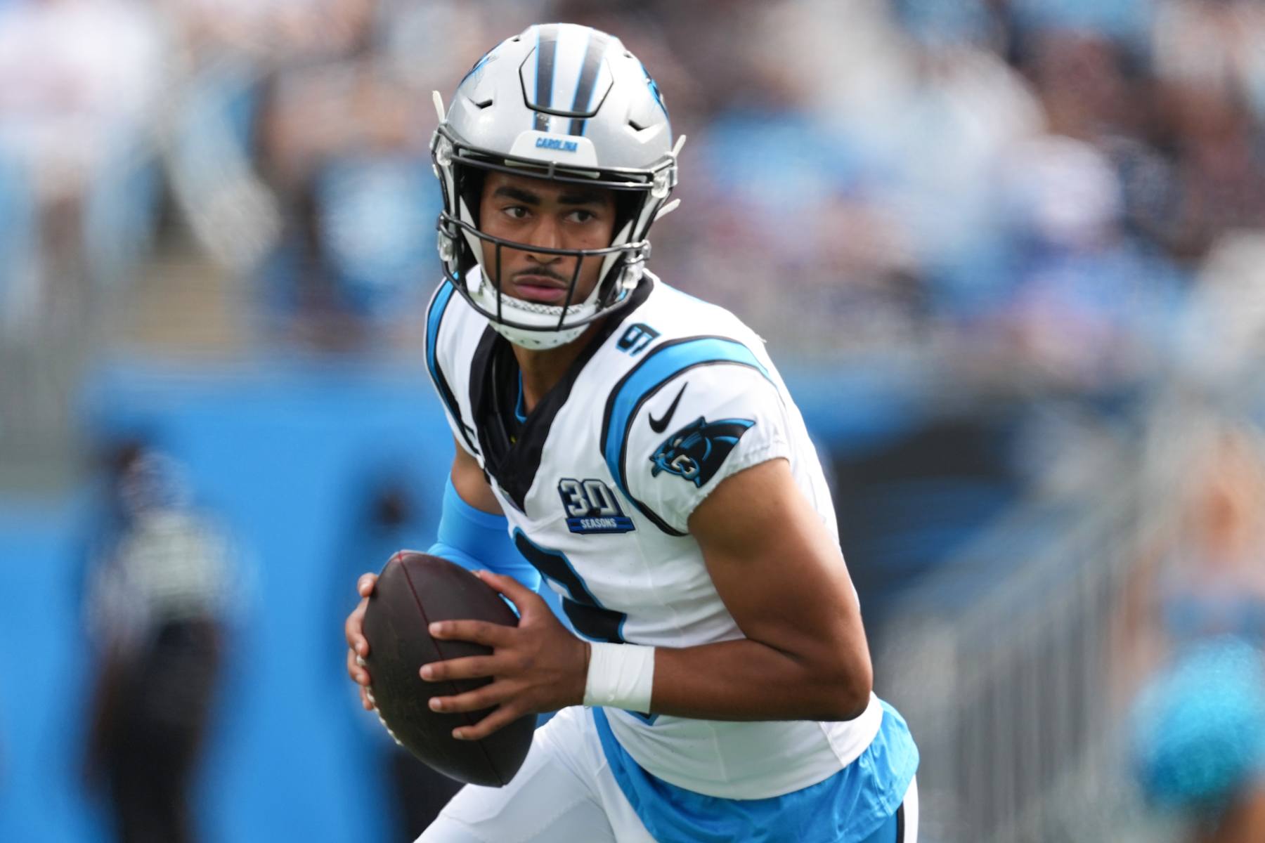 CHARLOTTE, NORTH CAROLINA - SEPTEMBER 15: Quarterback Bryce Young #9 of the Carolina Panthers looks to pass during the fourth quarter against the Los Angeles Chargers at Bank of America Stadium on September 15, 2024 in Charlotte, North Carolina. (Photo by Grant Halverson/Getty Images)