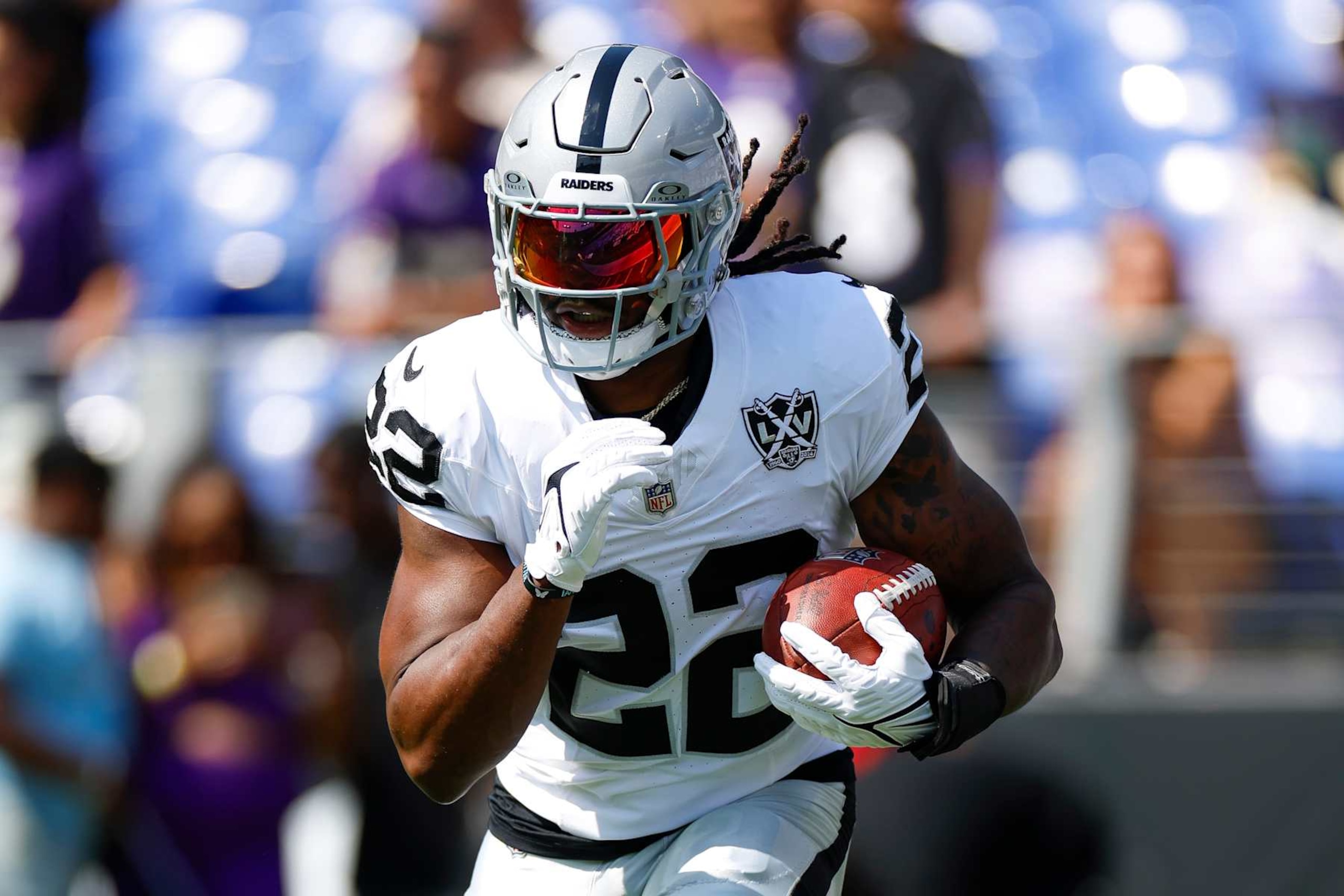 BALTIMORE, MARYLAND - SEPTEMBER 15: Alexander Mattison #22 of the Las Vegas Raiders warms up prior to game against the Baltimore Ravens at M&T Bank Stadium on September 15, 2024 in Baltimore, Maryland. (Photo by Brandon Sloter/Getty Images)