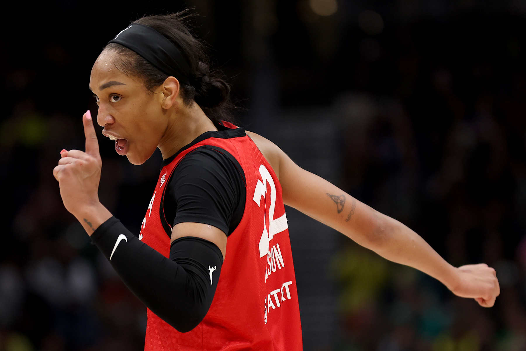 SEATTLE, WASHINGTON - SEPTEMBER 17: A'ja Wilson #22 of the Las Vegas Aces reacts during the fourth quarter against the Seattle Storm at Climate Pledge Arena on September 17, 2024 in Seattle, Washington. NOTE TO USER: User expressly acknowledges and agrees that, by downloading and or using this photograph, User is consenting to the terms and conditions of the Getty Images License Agreement. (Photo by Steph Chambers/Getty Images)