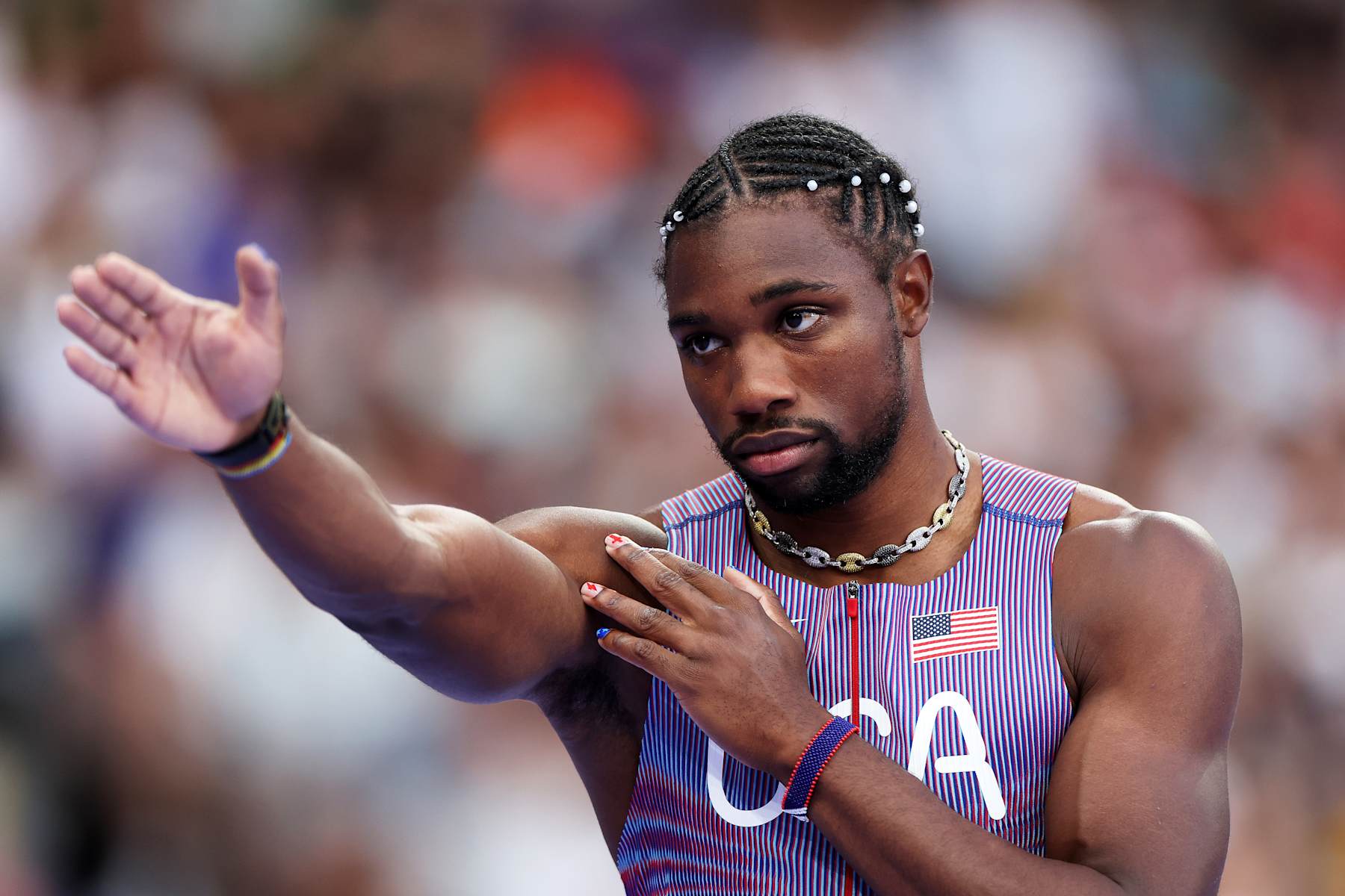 PARIS, FRANCE - AUGUST 07: Noah Lyles of Team United States reacts during in the Men's 200m Semi-Final on day twelve of the Olympic Games Paris 2024 at Stade de France on August 07, 2024 in Paris, France. (Photo by Cameron Spencer/Getty Images)